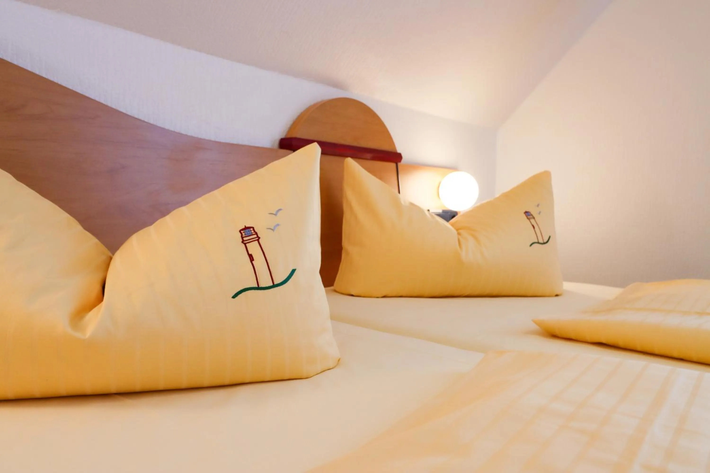 Bed in Aparthotel Leuchtfeuer Rügen