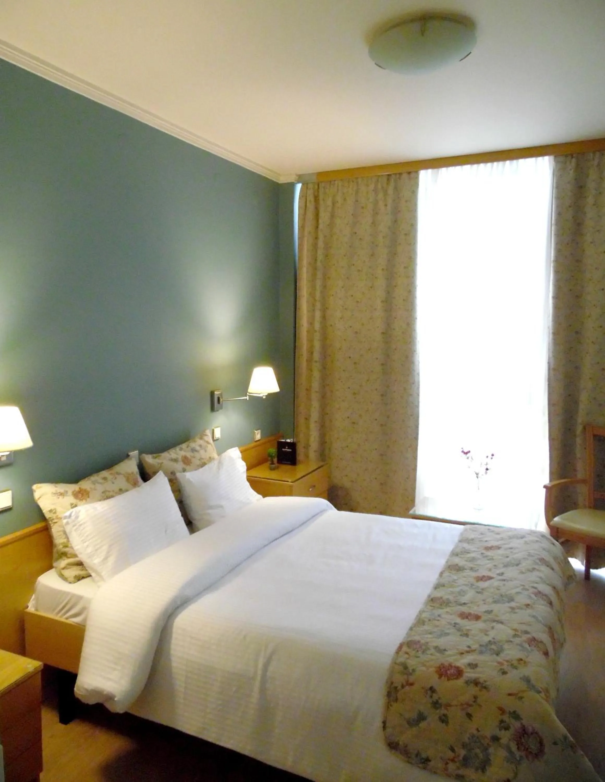 Bed in Hotel Xanthippion