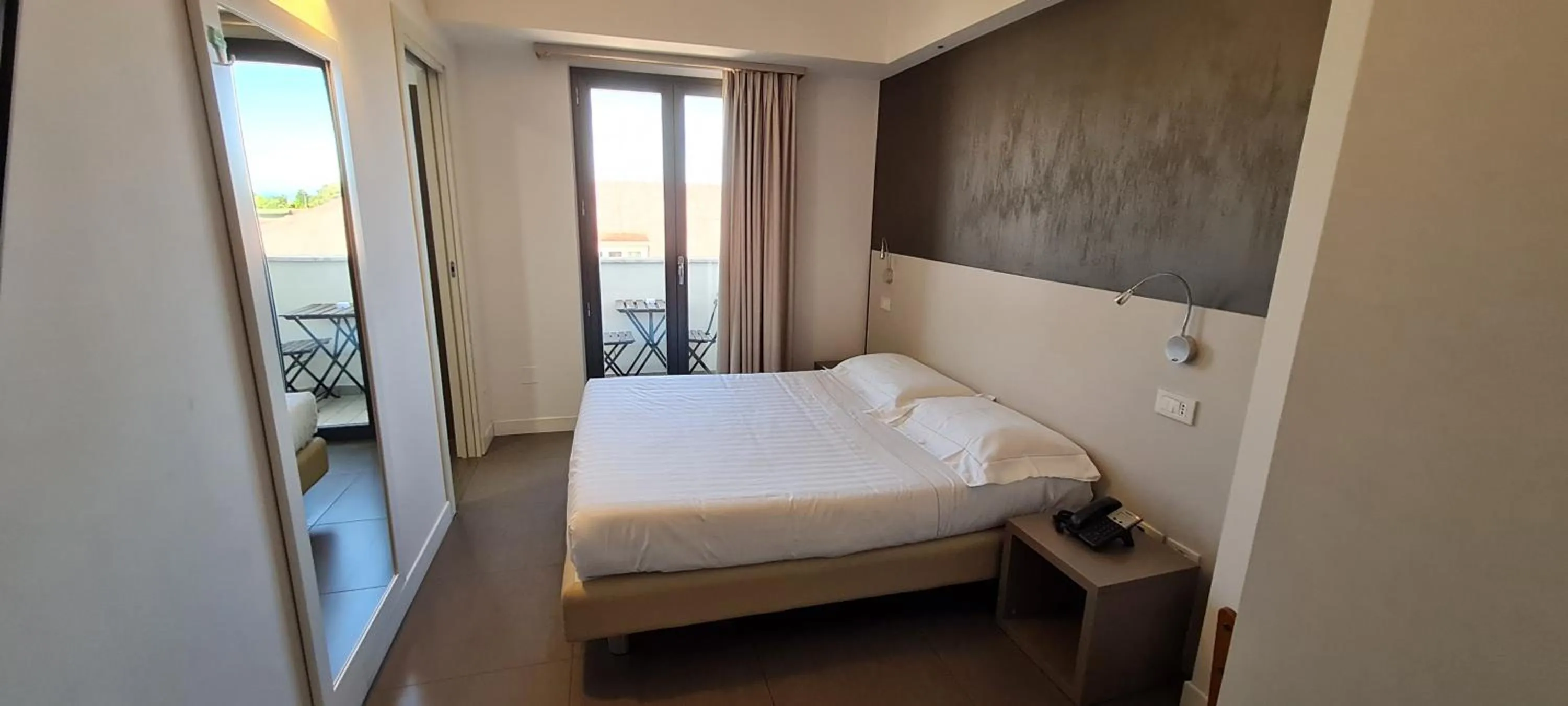 Bed in Hotel Arlecchino