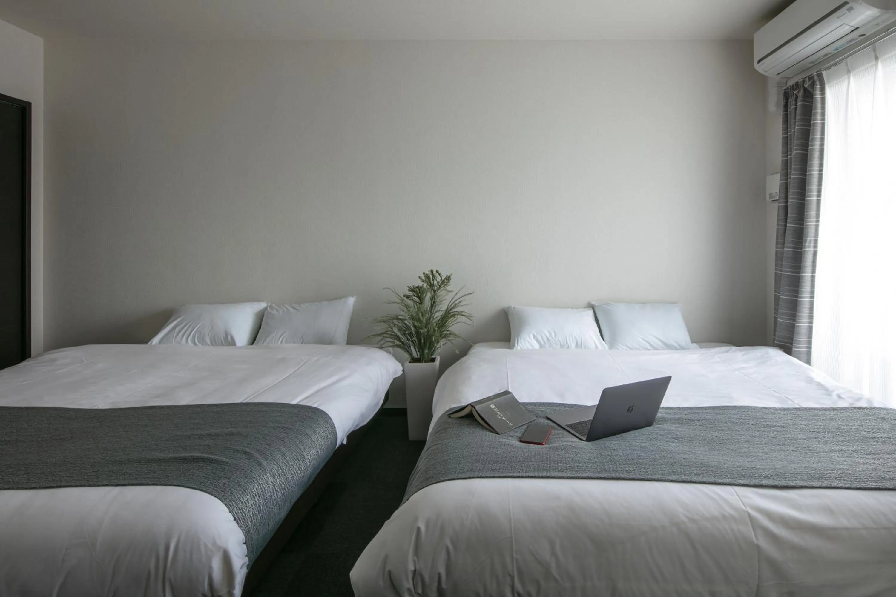 Bed in Randor Residence Kyoto Classic