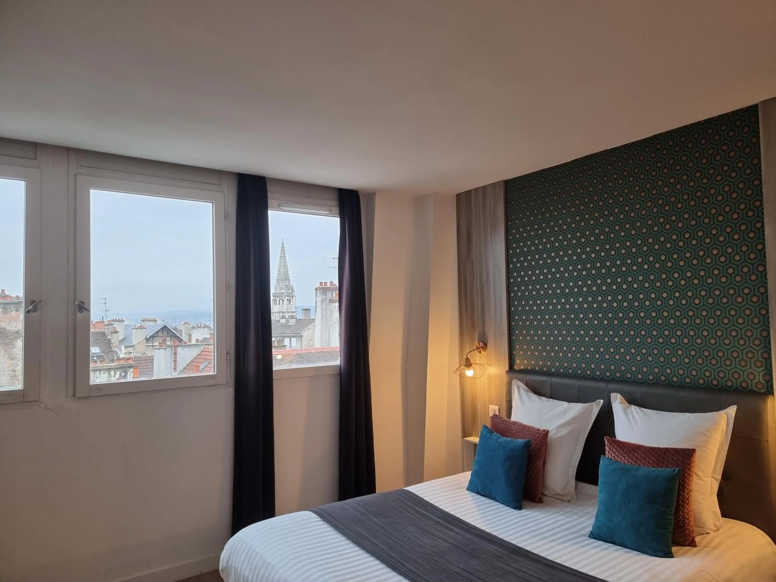 Bed in City Loft Apparthotel