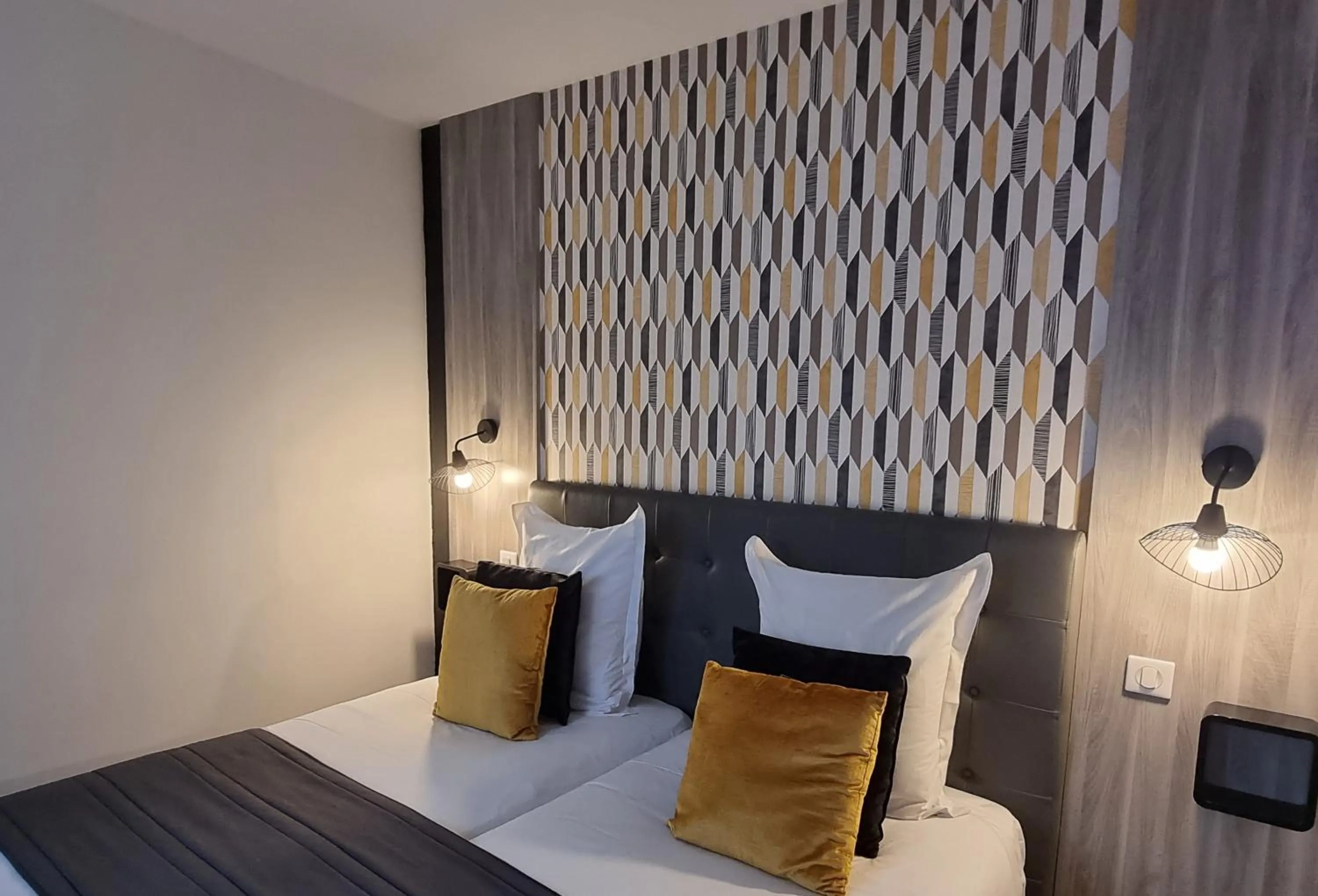 Bed in City Loft Apparthotel