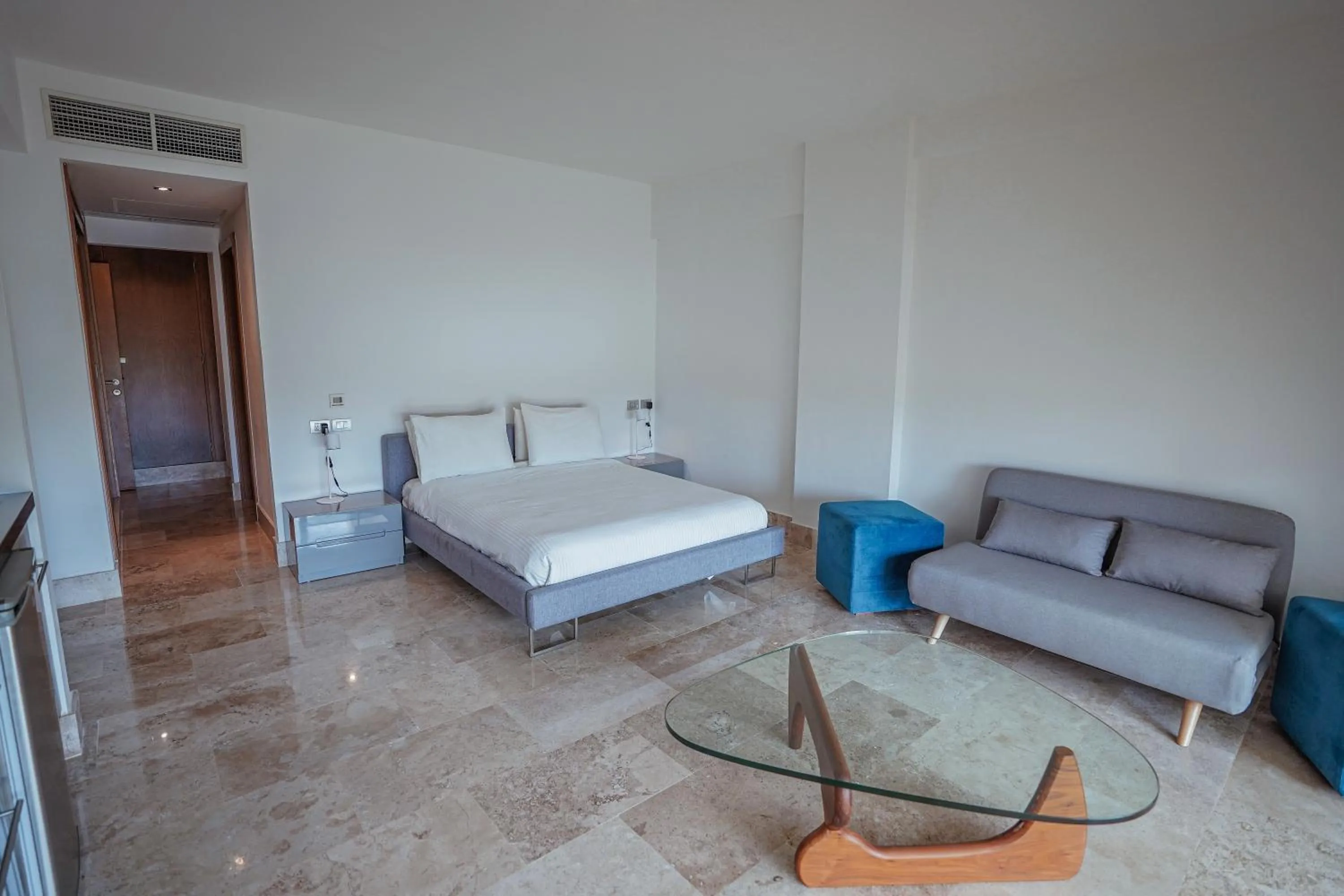 Photo of the whole room, Bed in La Amada condo with Marina View