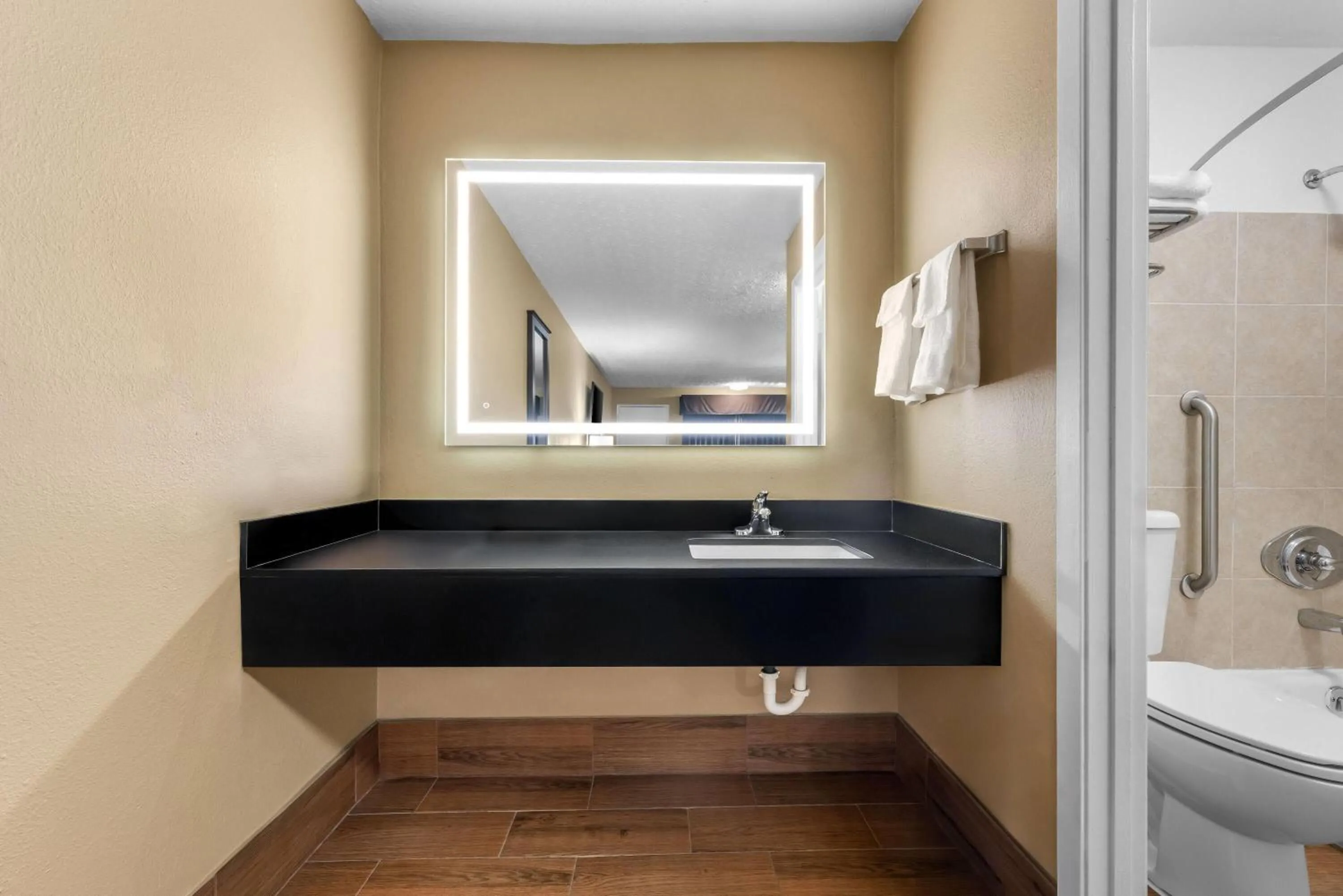 Bathroom in Super 8 by Wyndham Gadsden AL