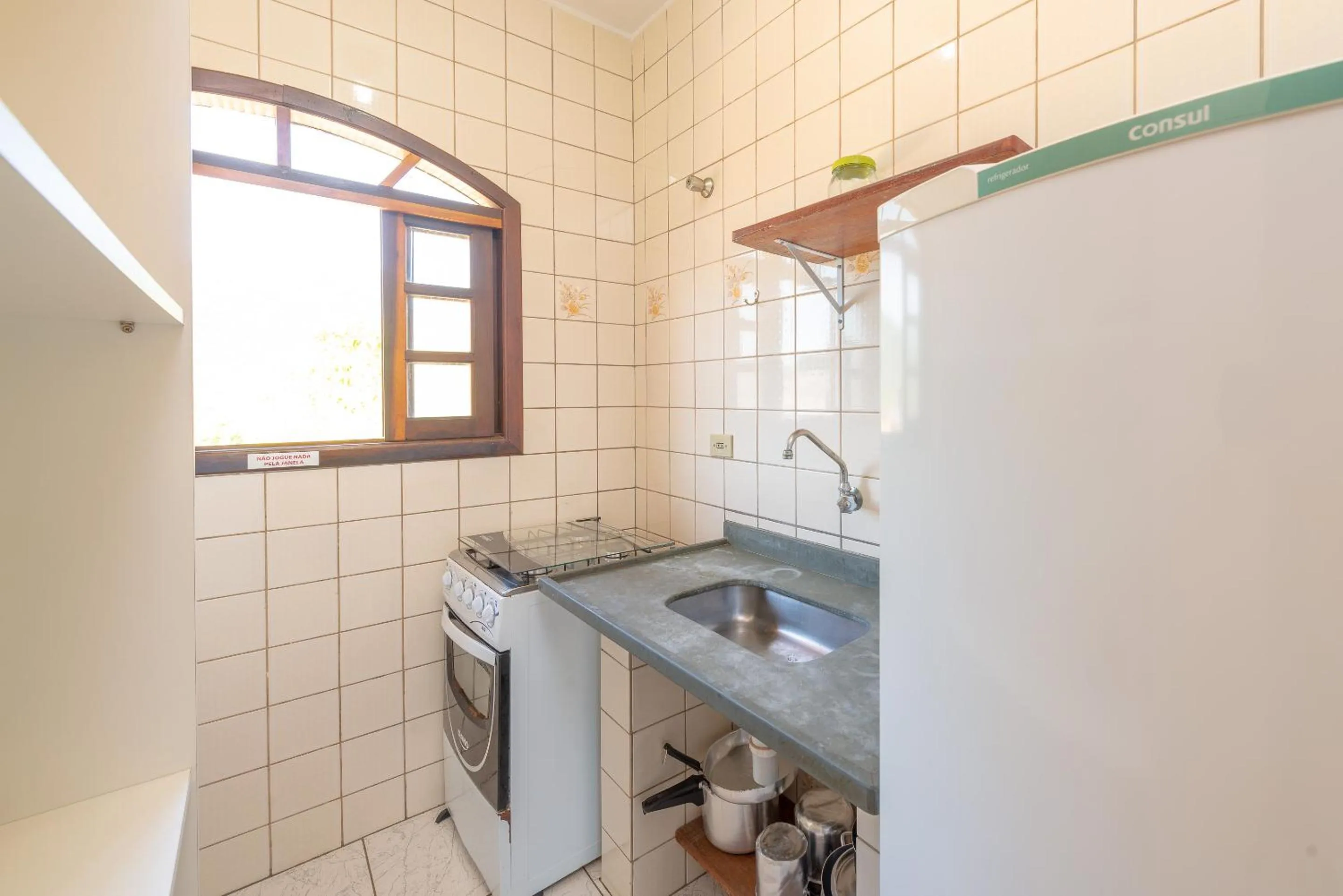 Kitchen or kitchenette in Chalés Four Seasons