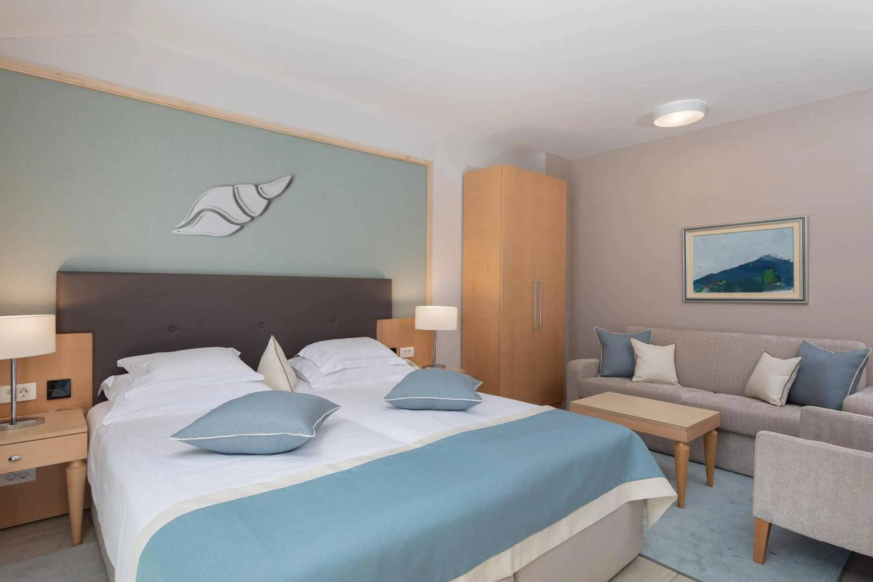 Bed in Aparthotel Flora