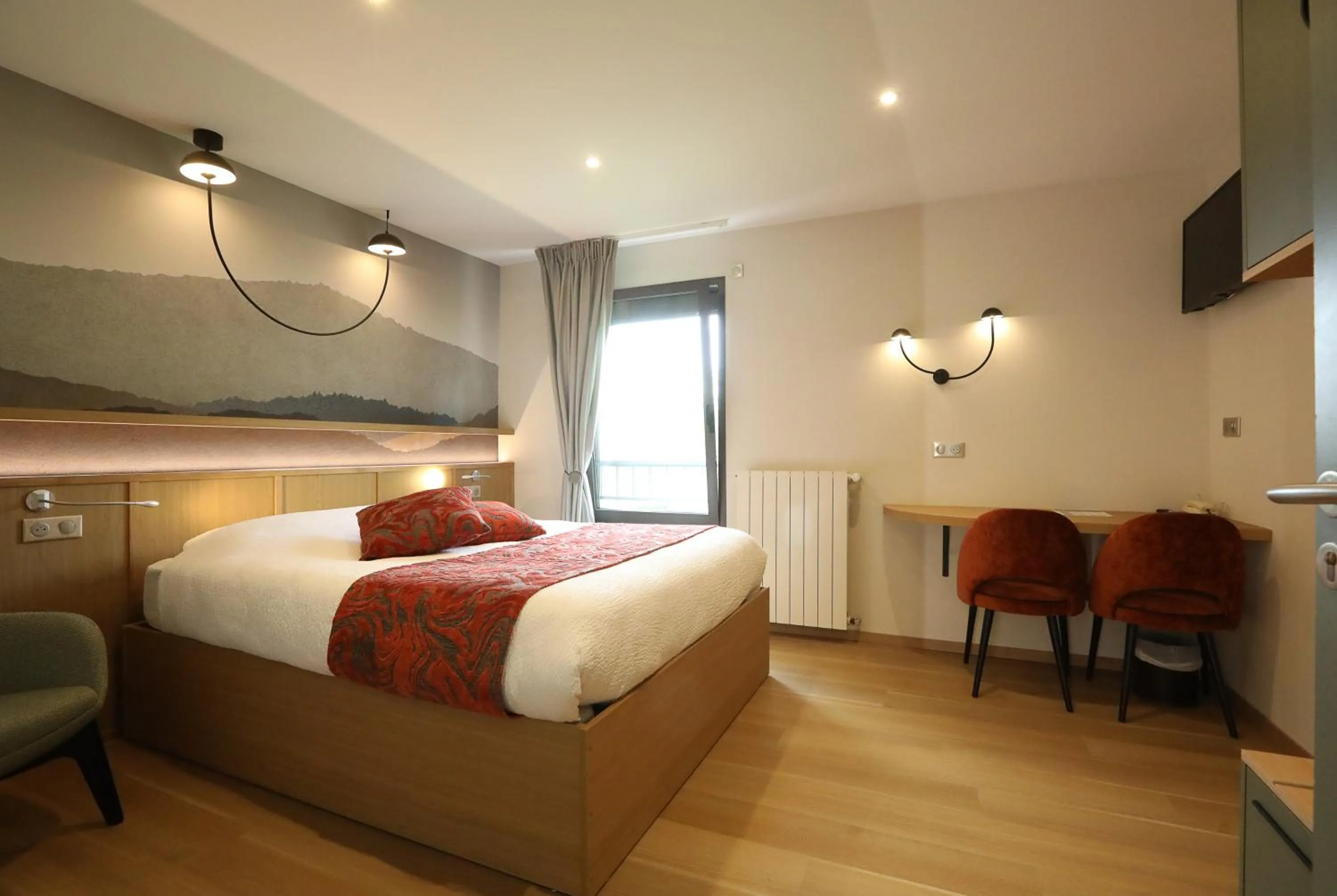 Bed in Logis Hotel Spa Restaurant Le Provence