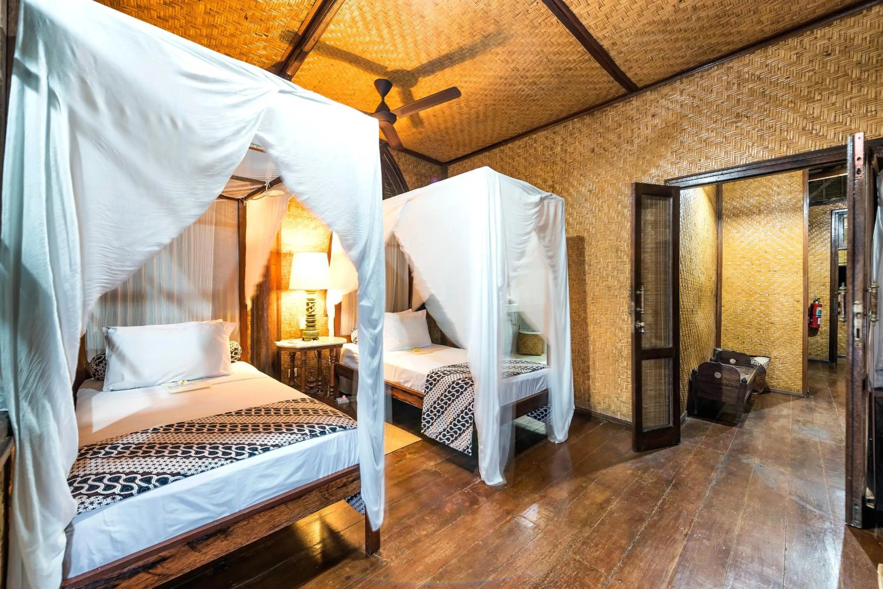 Bed in Aashaya Jasri Resort