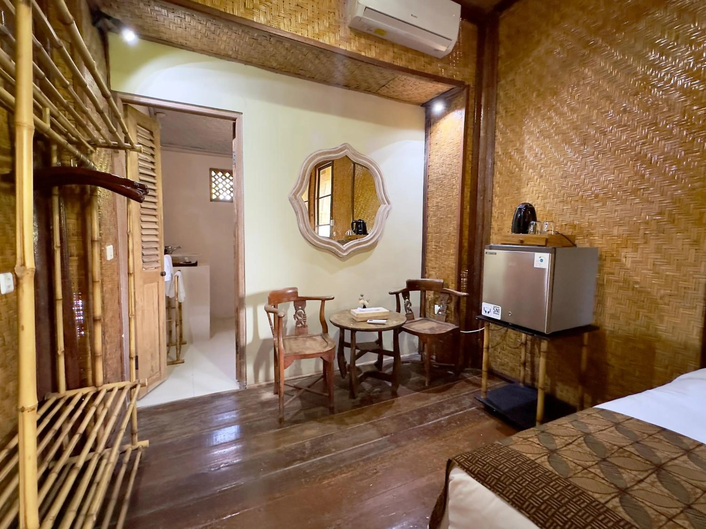 Bed in Aashaya Jasri Resort