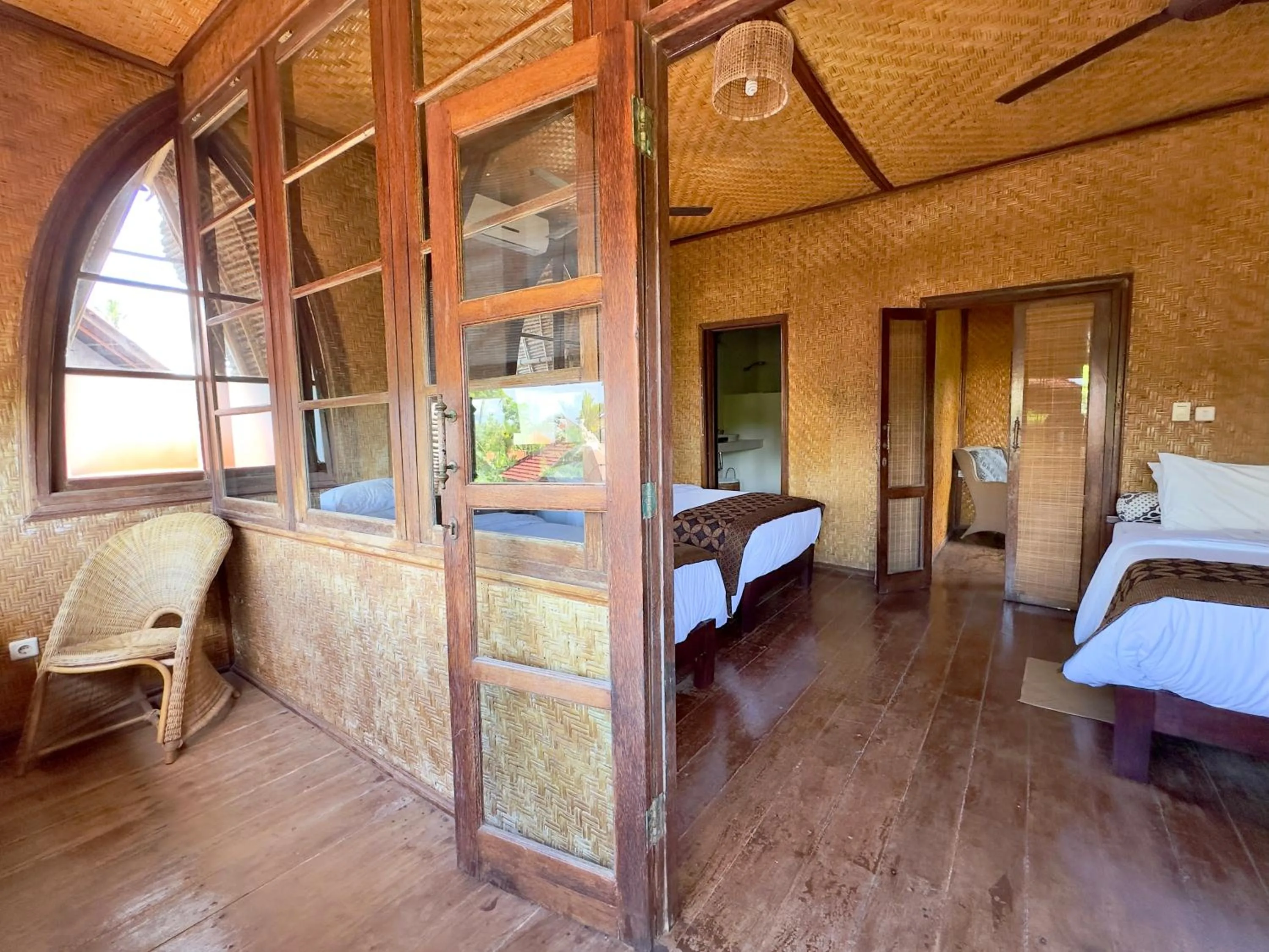 Bed in Aashaya Jasri Resort