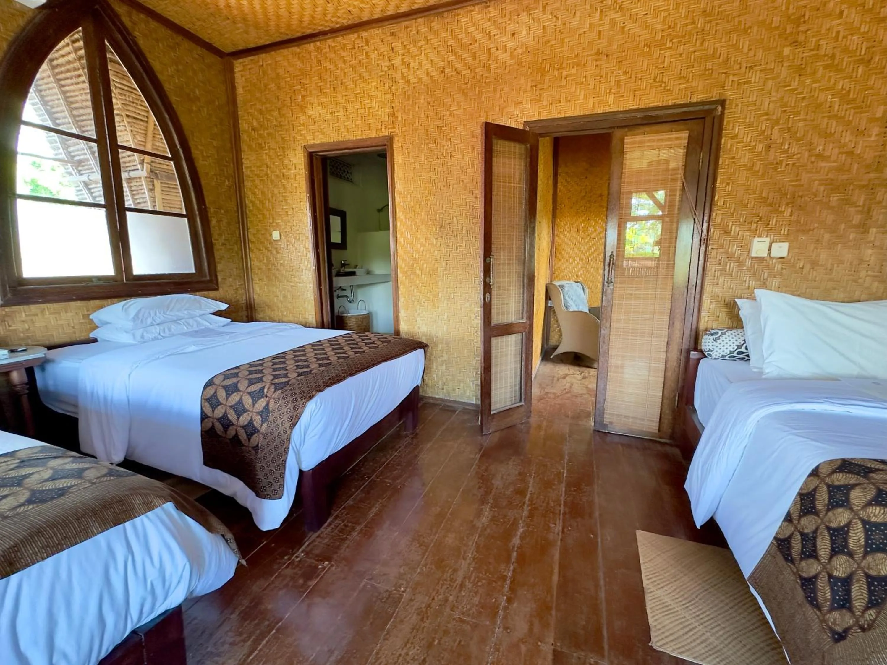 Bed in Aashaya Jasri Resort