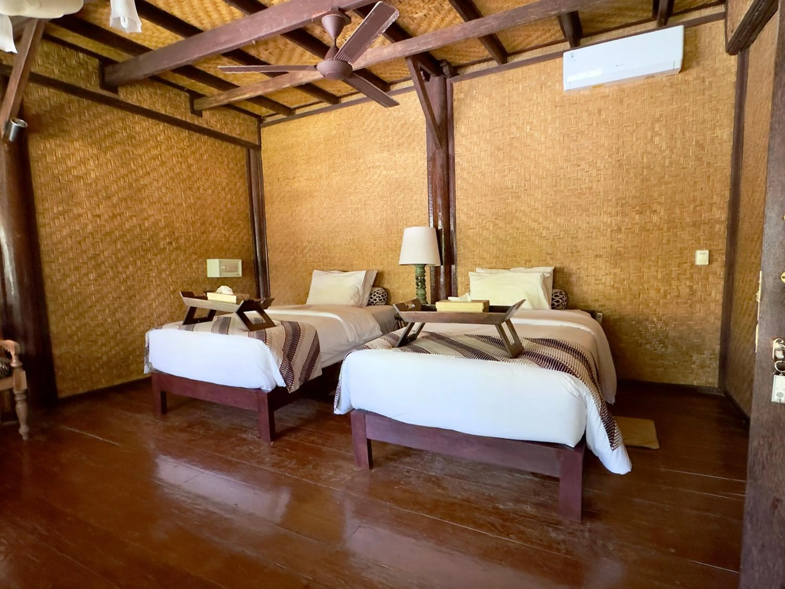Bed in Aashaya Jasri Resort