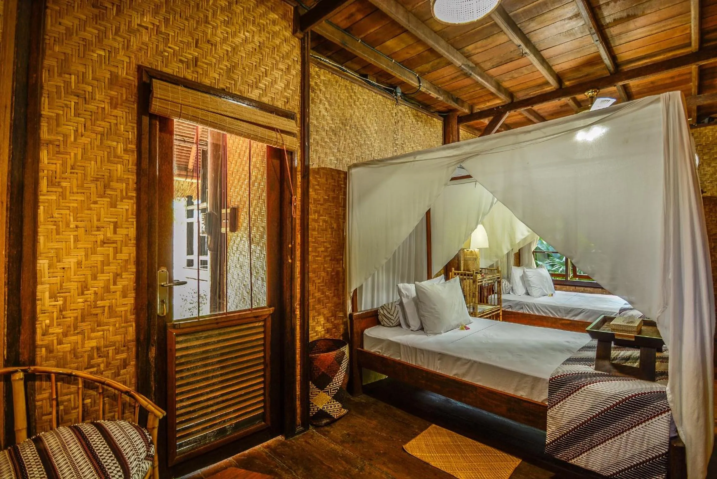 Bed in Aashaya Jasri Resort