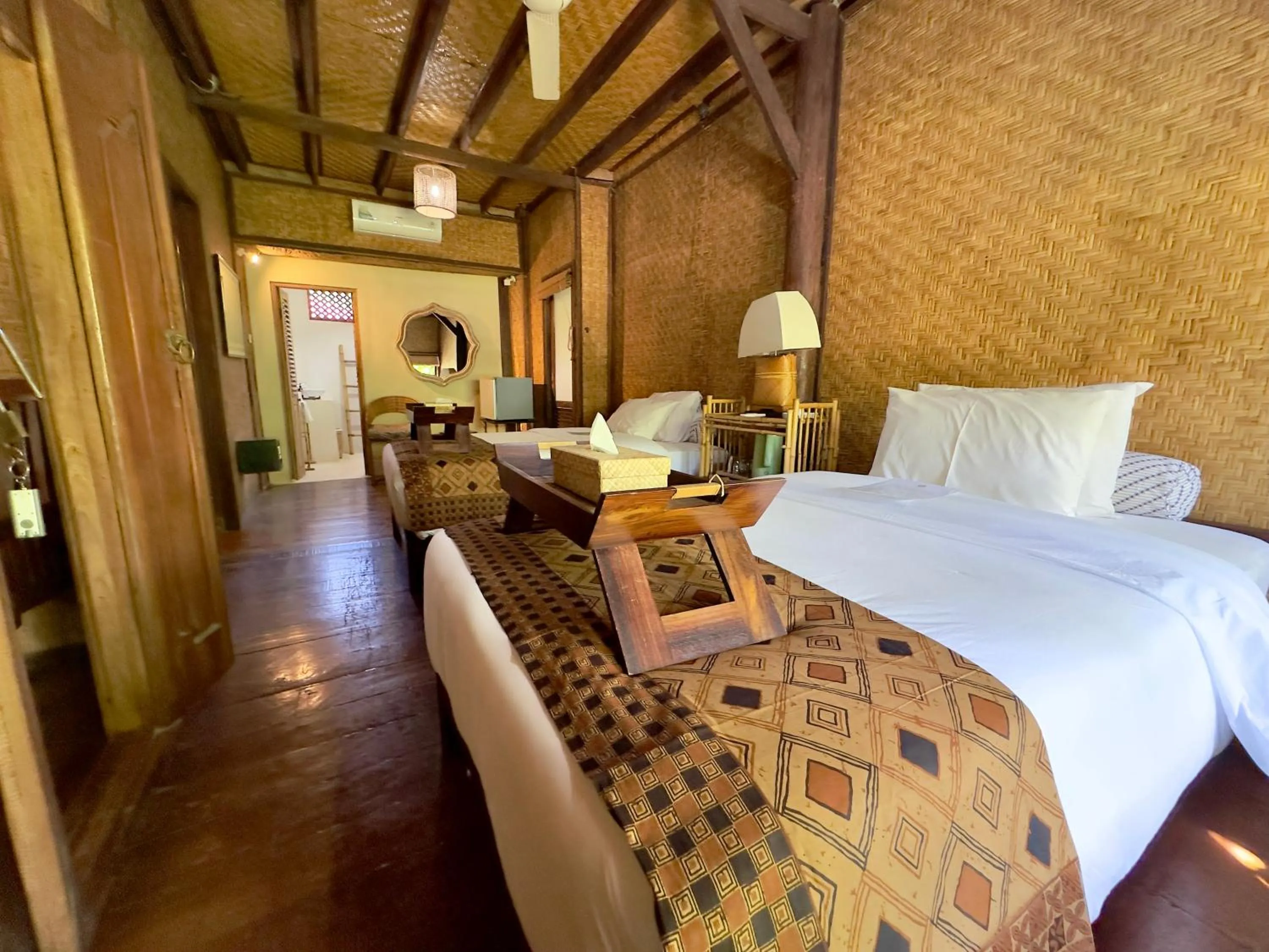 Bed in Aashaya Jasri Resort