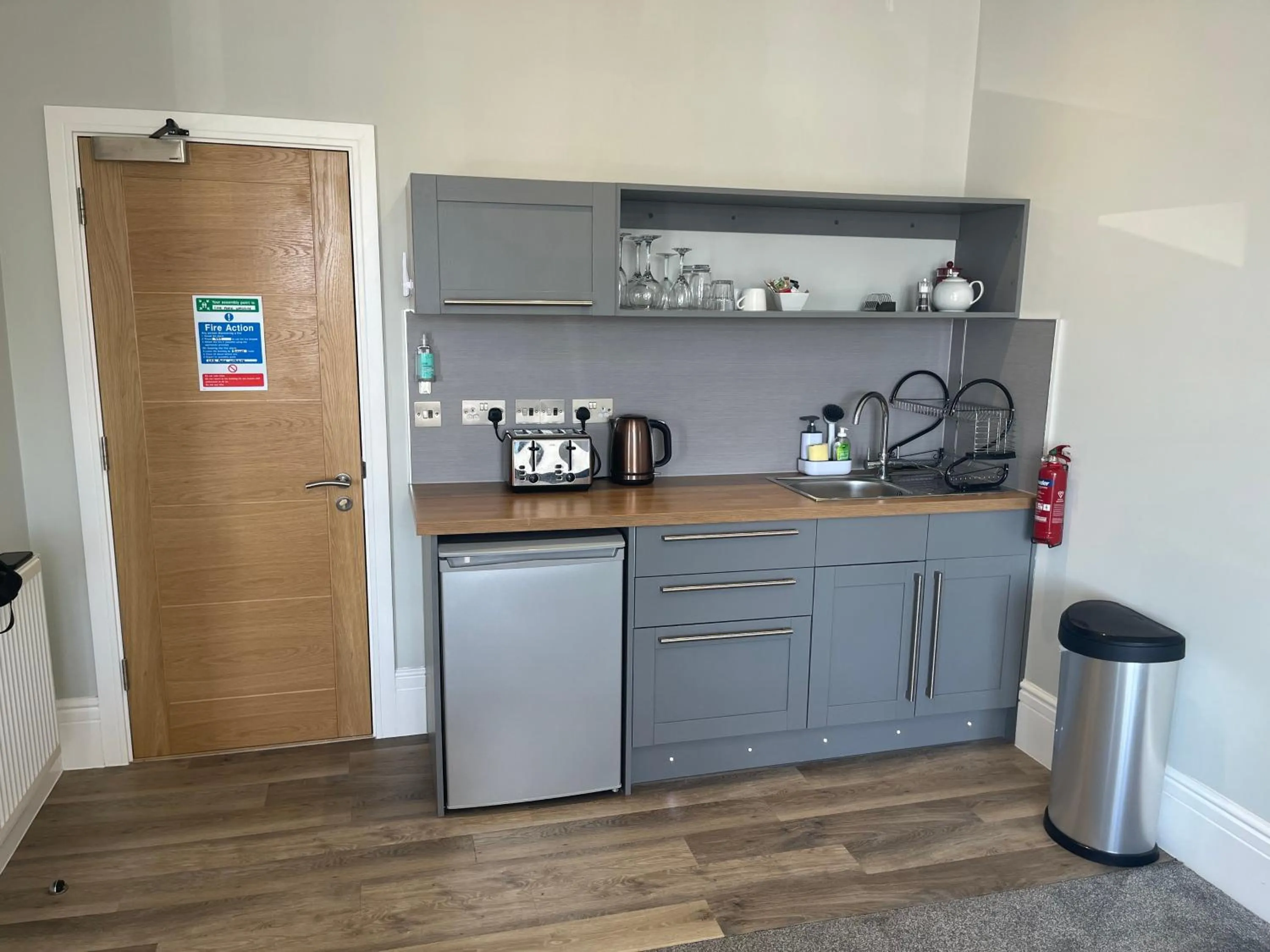 Kitchen or kitchenette in Harmony Apartments