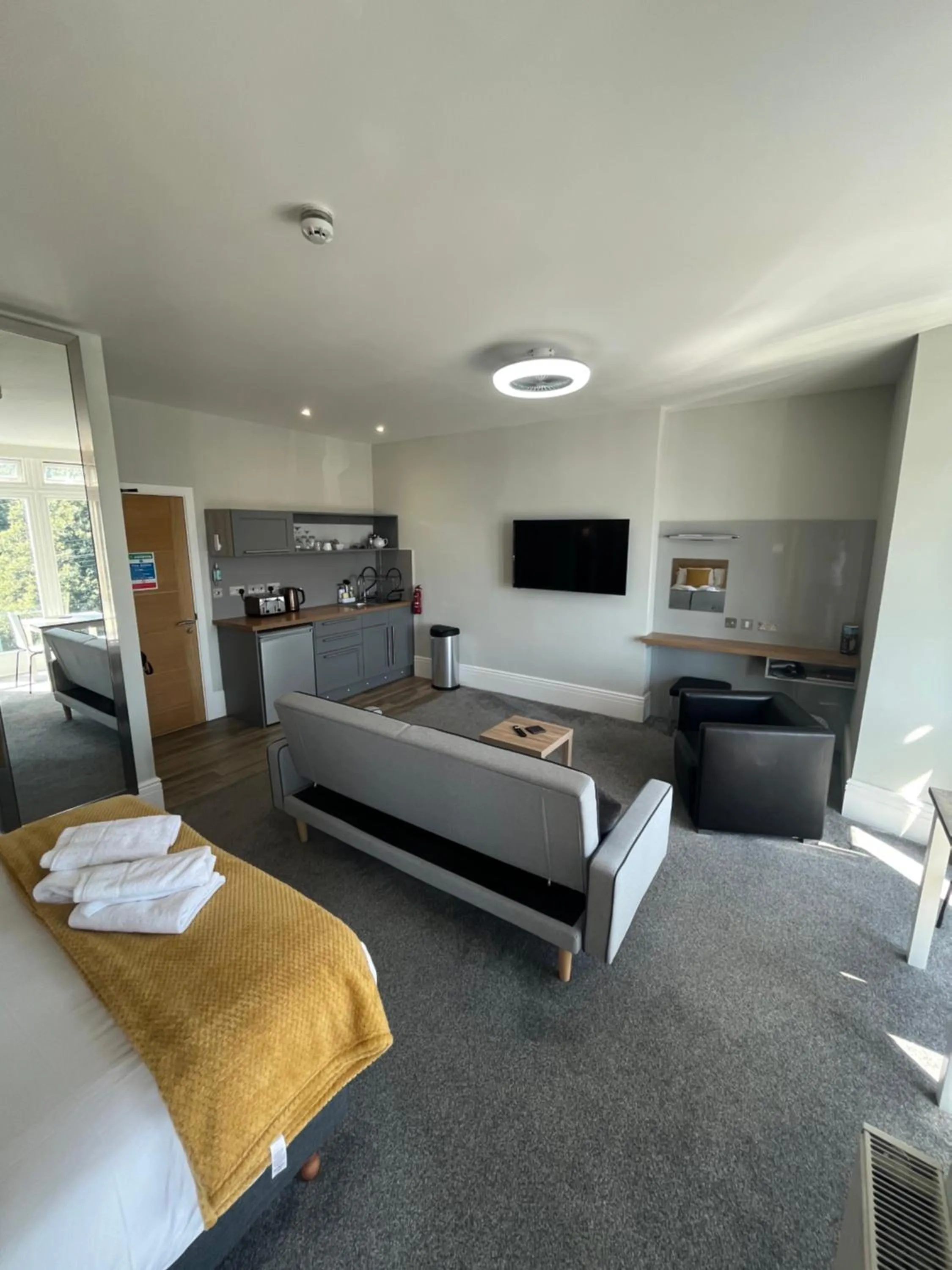 Photo of the whole room, Bed in Harmony Apartments