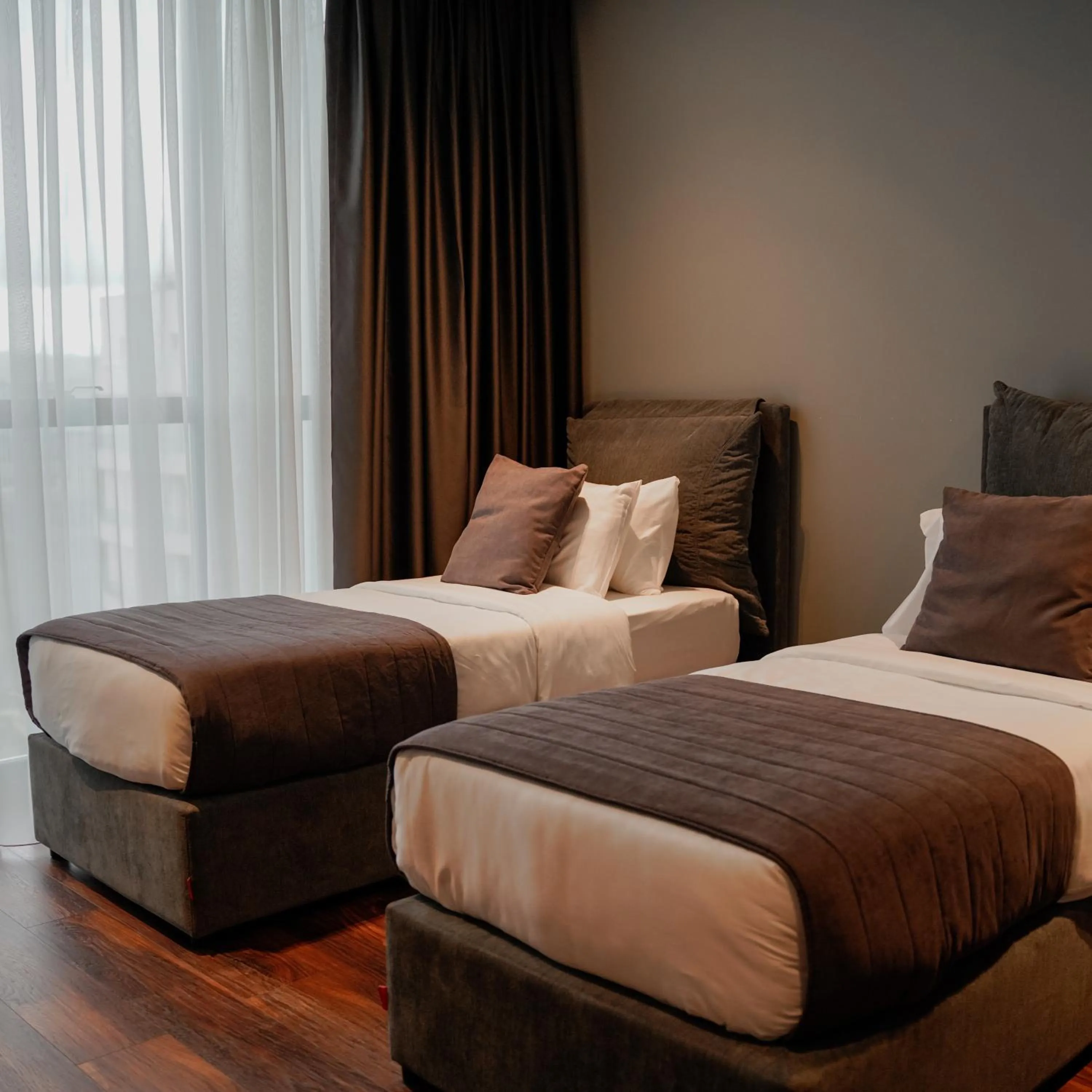 Bed in Supreme Hotel