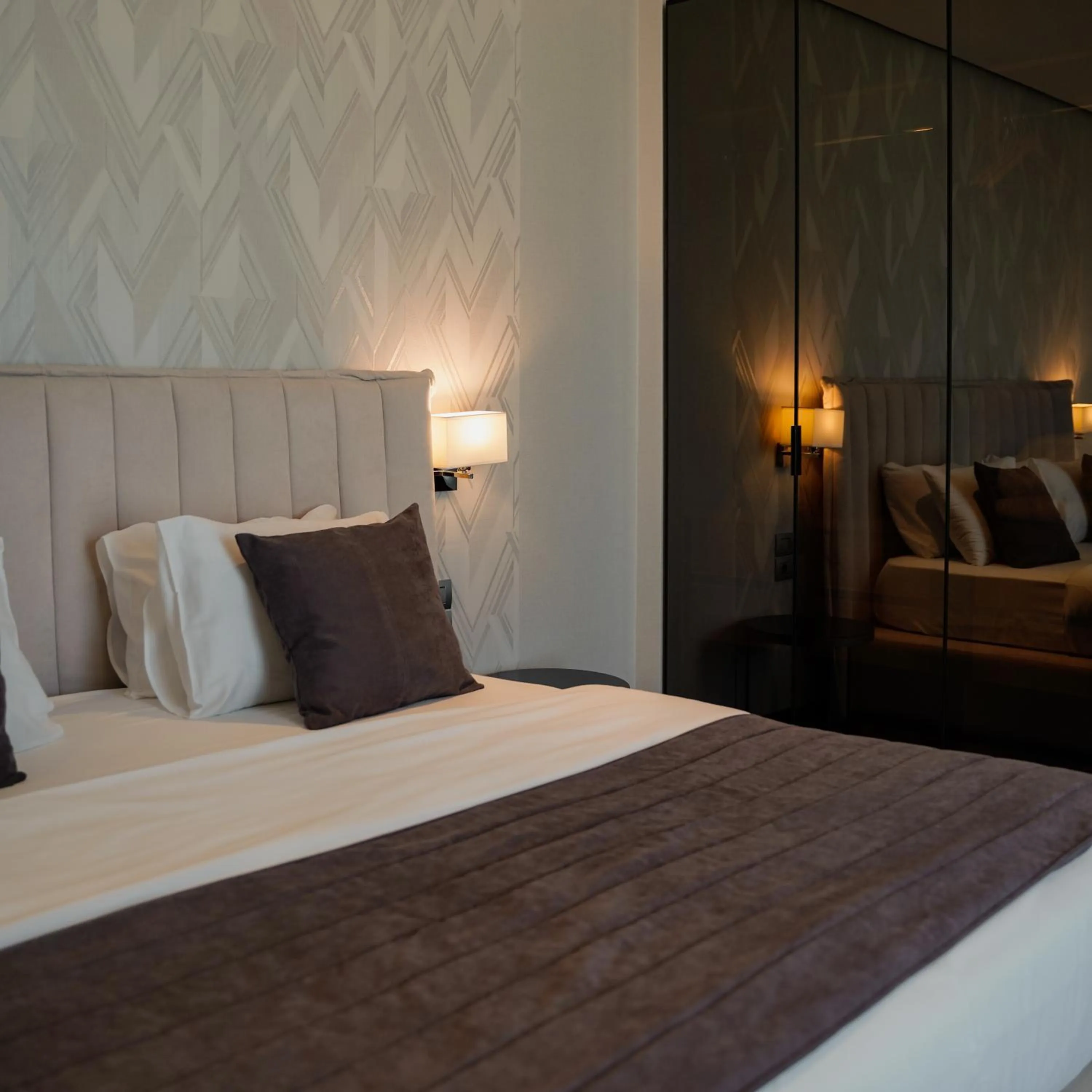 Bed in Supreme Hotel