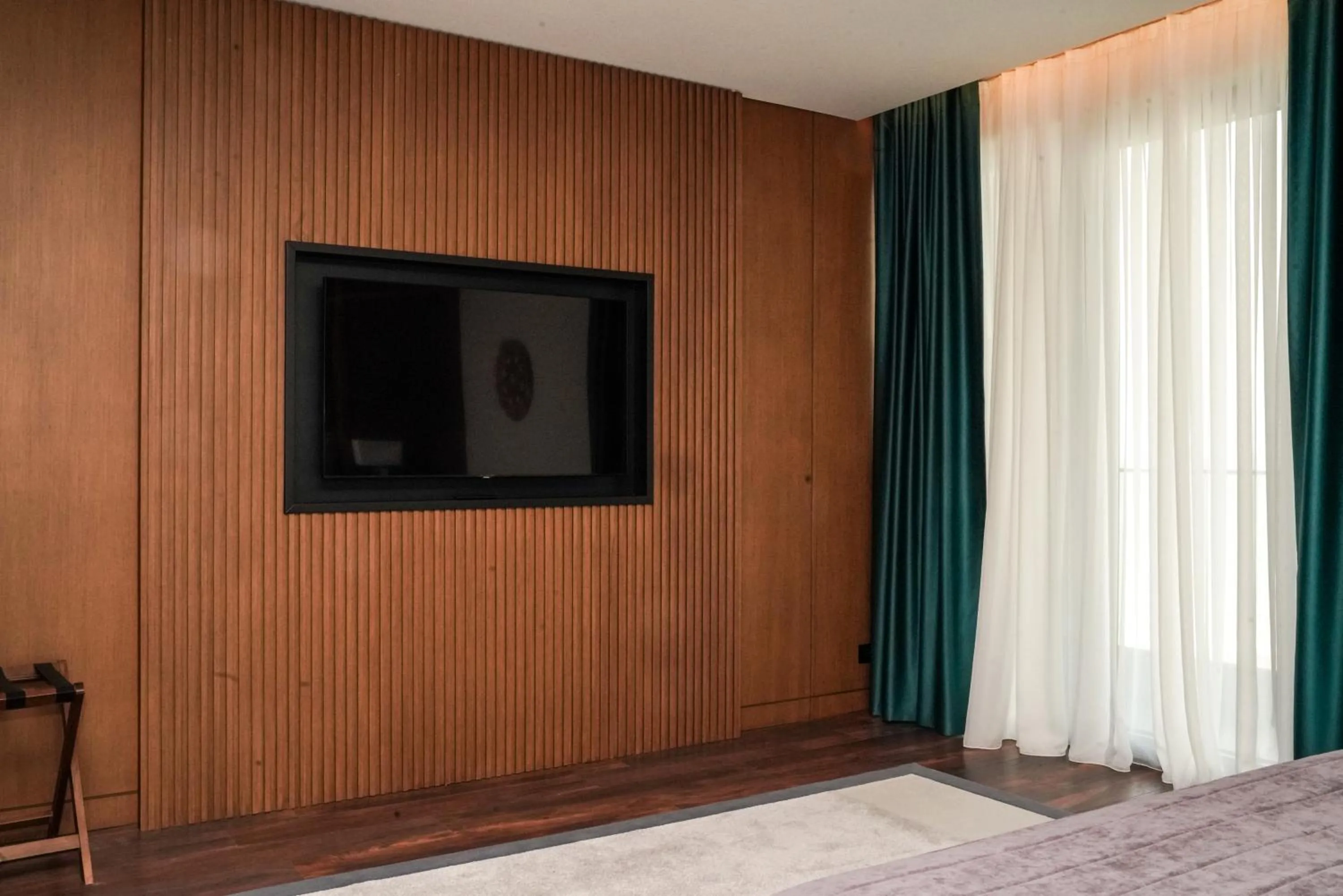 Communal lounge/ TV room in Supreme Hotel