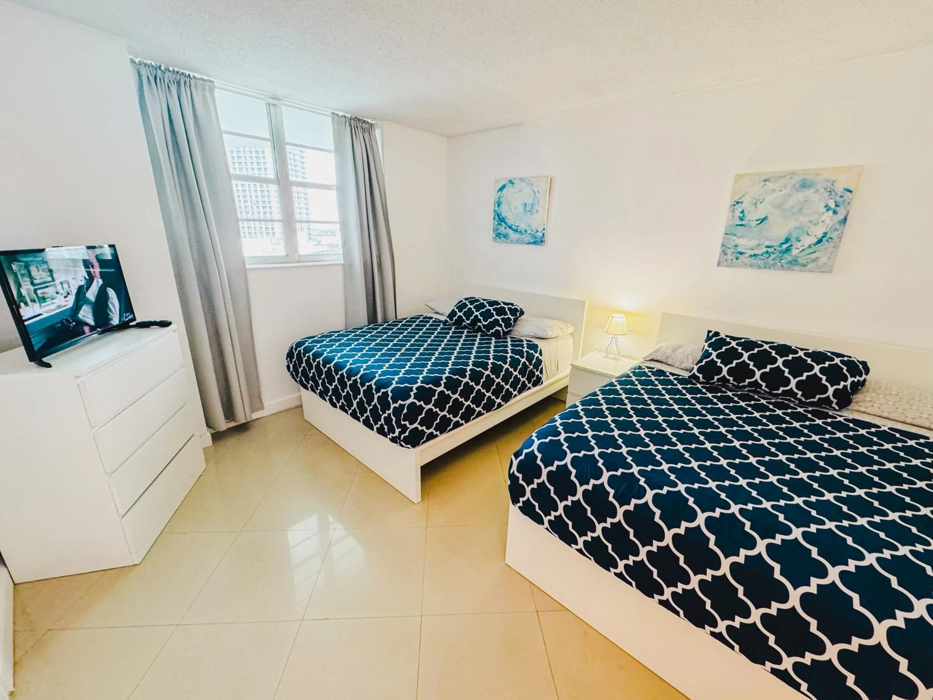 Bed in Hallandale Condo, Partial Ocean View Direct Beach and Pool Access Hollywood Beach