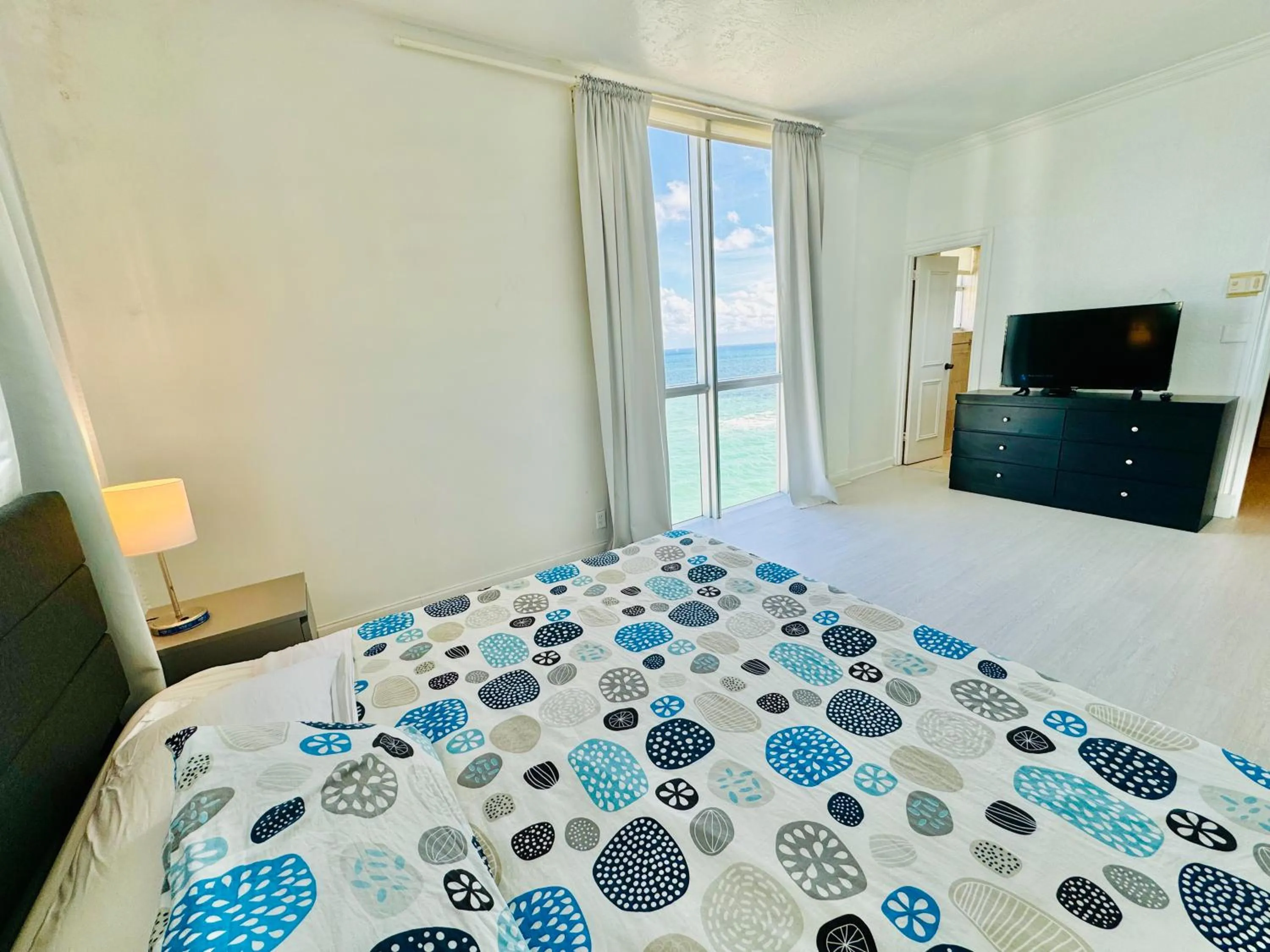 Bed in Hallandale Condo, Partial Ocean View Direct Beach and Pool Access Hollywood Beach