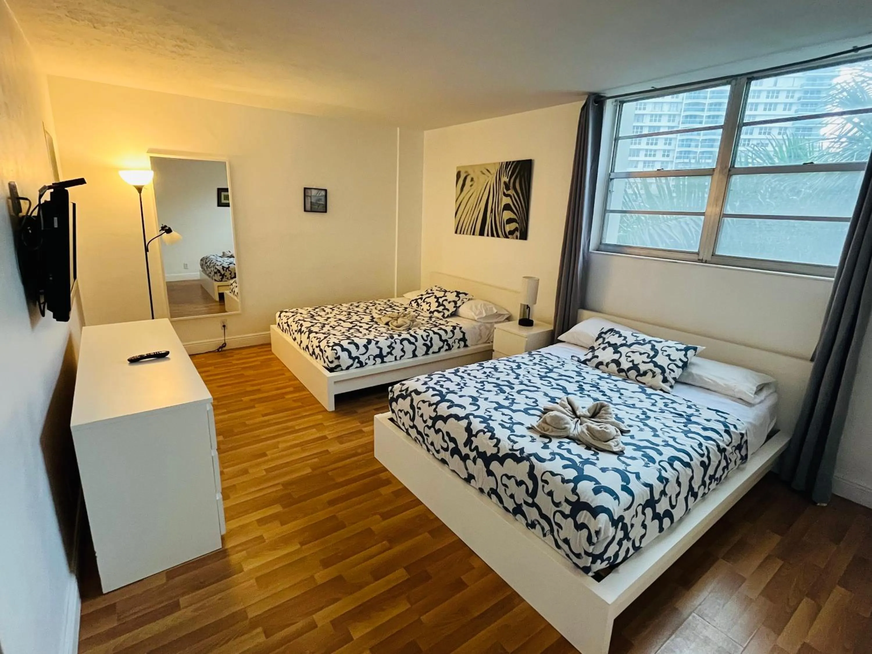 Bed in Hallandale Condo, Partial Ocean View Direct Beach and Pool Access Hollywood Beach