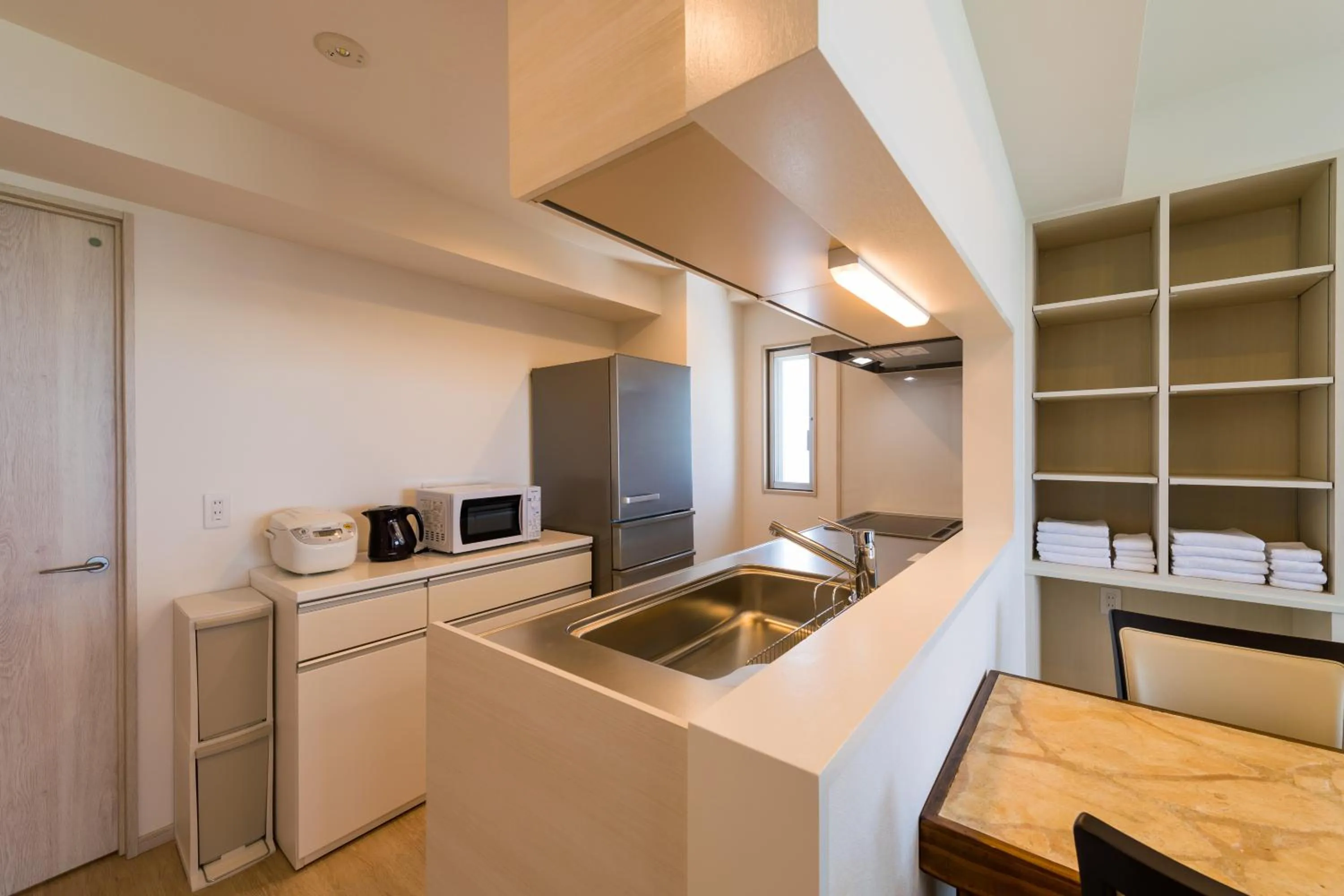 Kitchen or kitchenette in MINATO Chatan Seaside Condominium