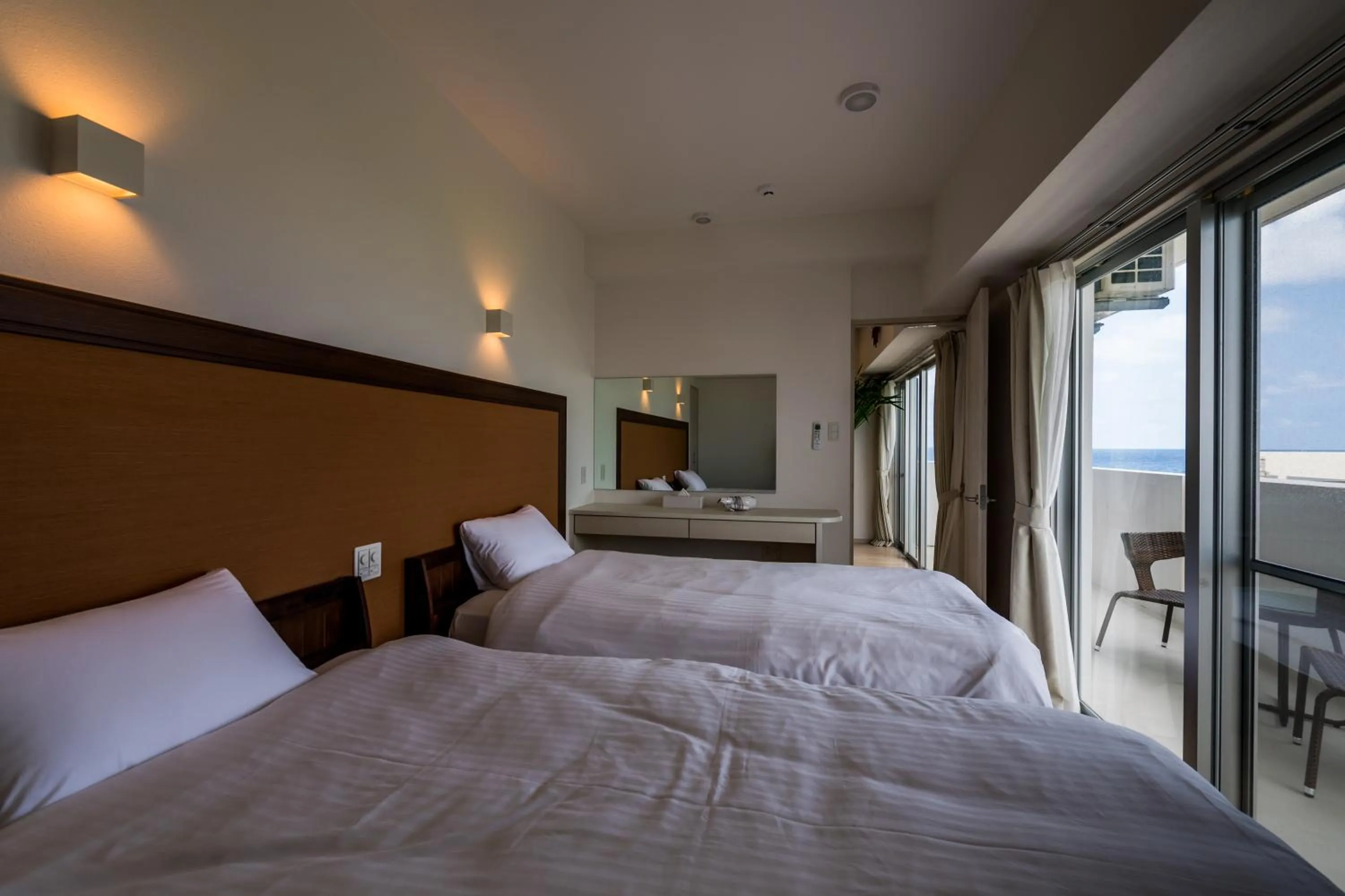 Bed in MINATO Chatan Seaside Condominium