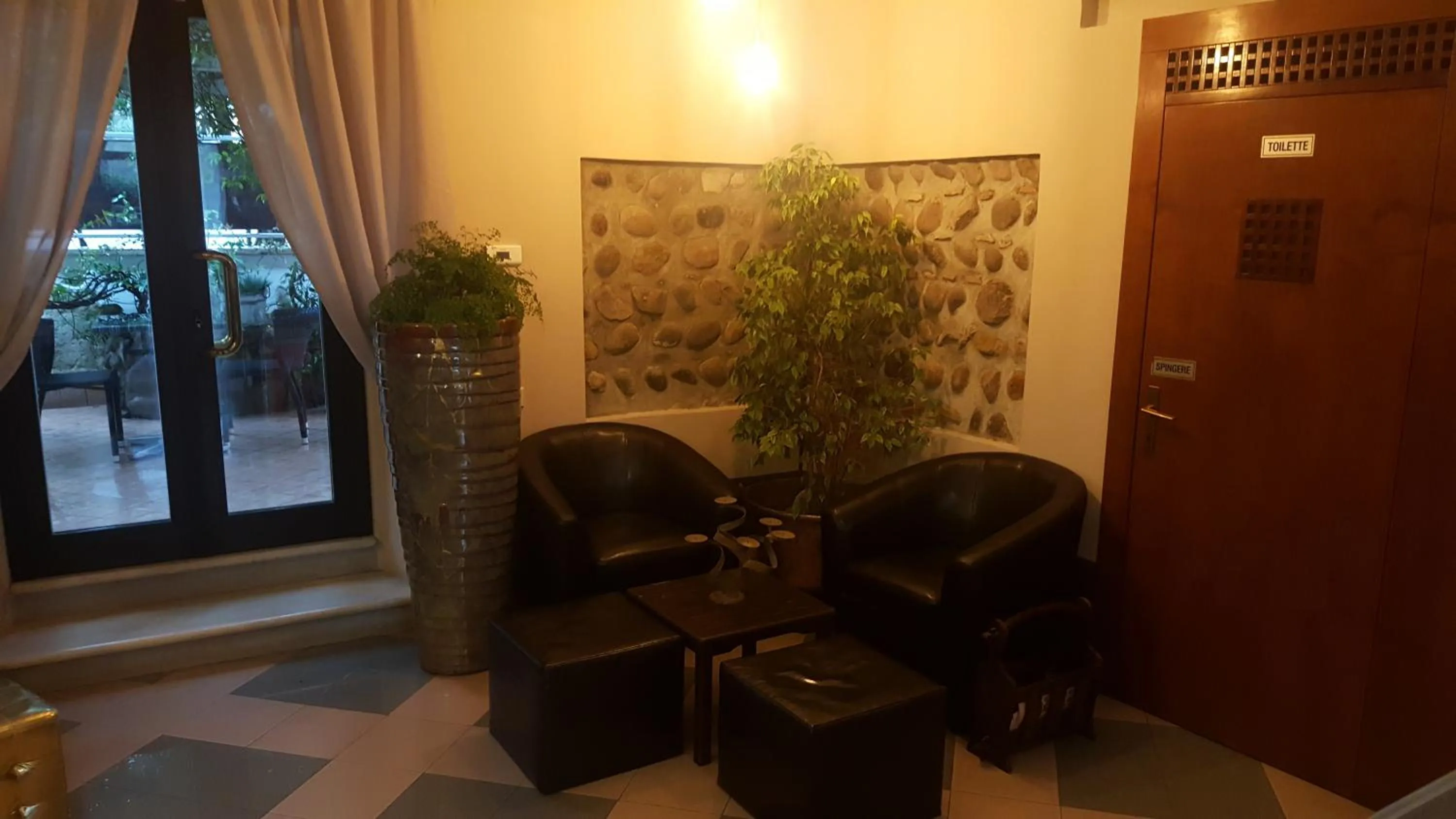 Communal lounge/ TV room in Boutique Hotel Corte Malaspina