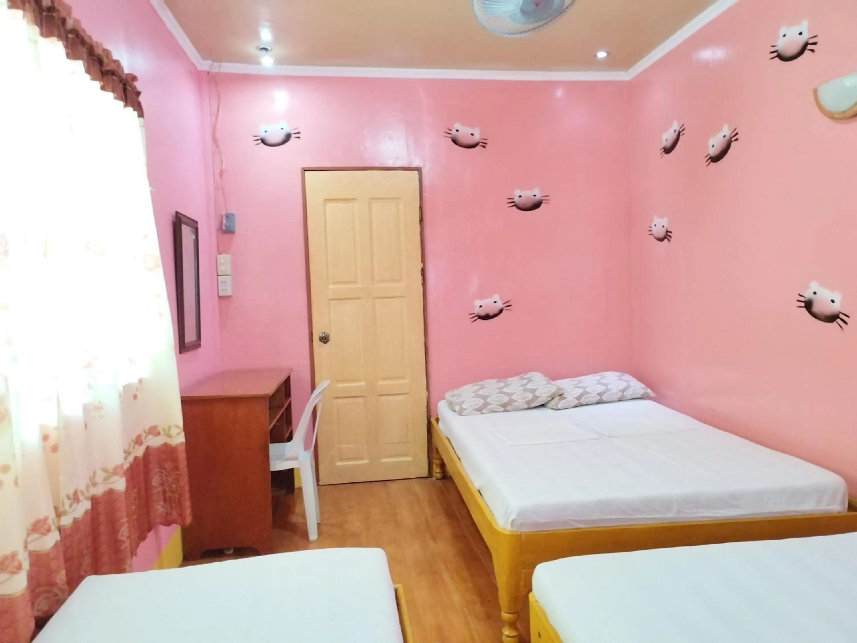 fireplace, Bed in Villa Corrales Homestay