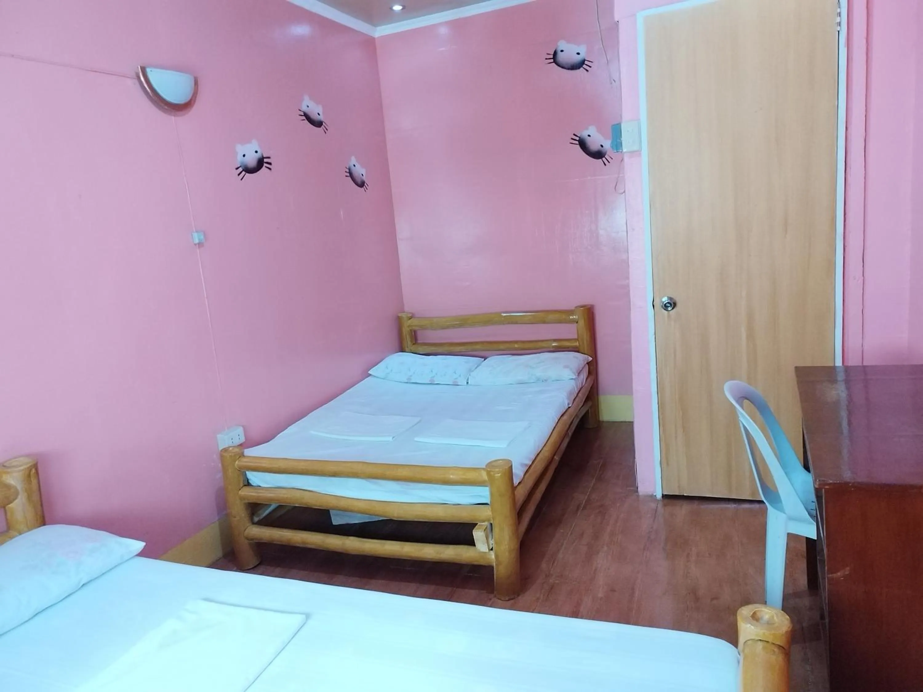 fireplace, Bed in Villa Corrales Homestay