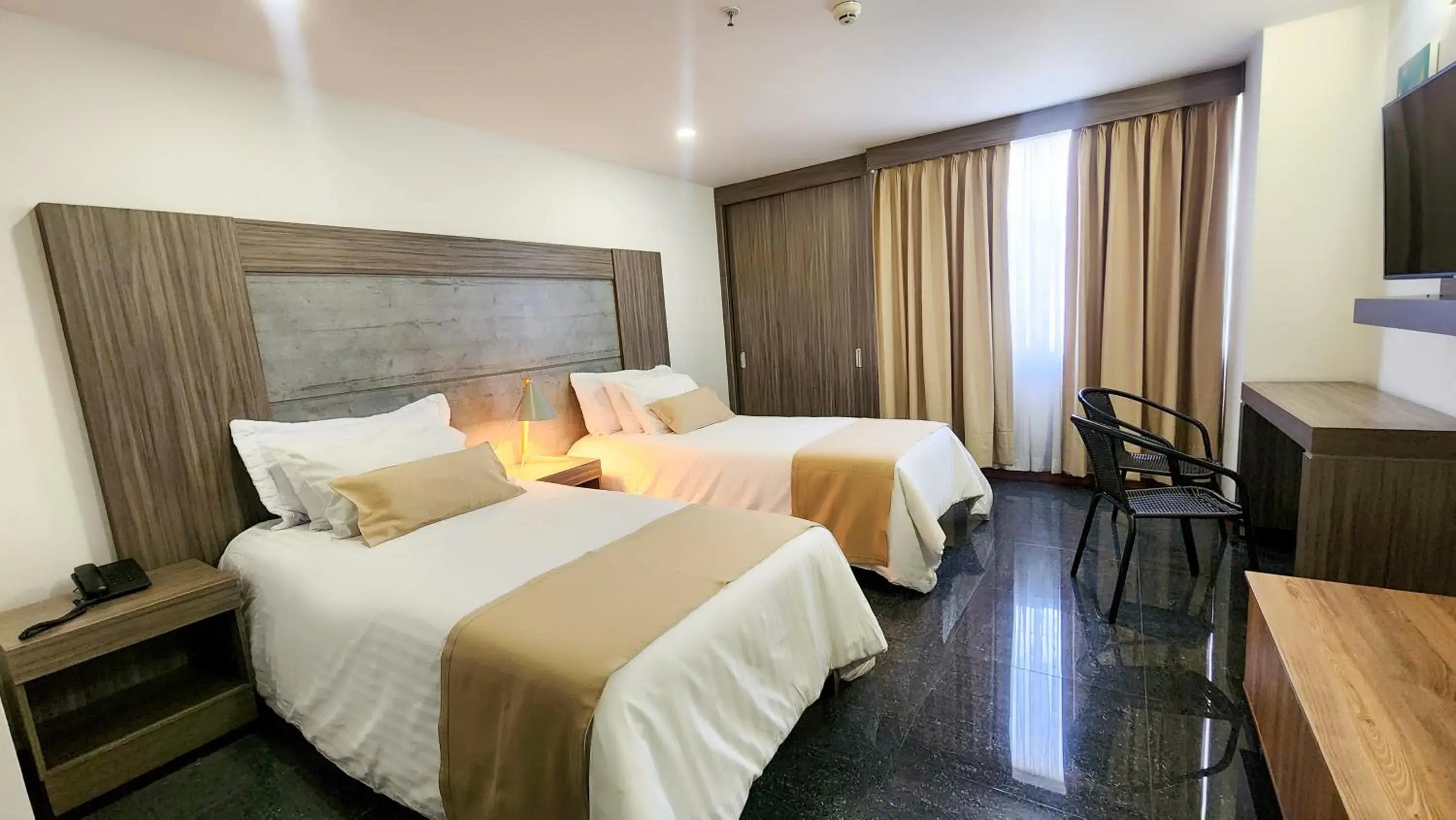 Twin Room in BE Suites Hotel Cali Twin Room in BE Suites Hotel Cali