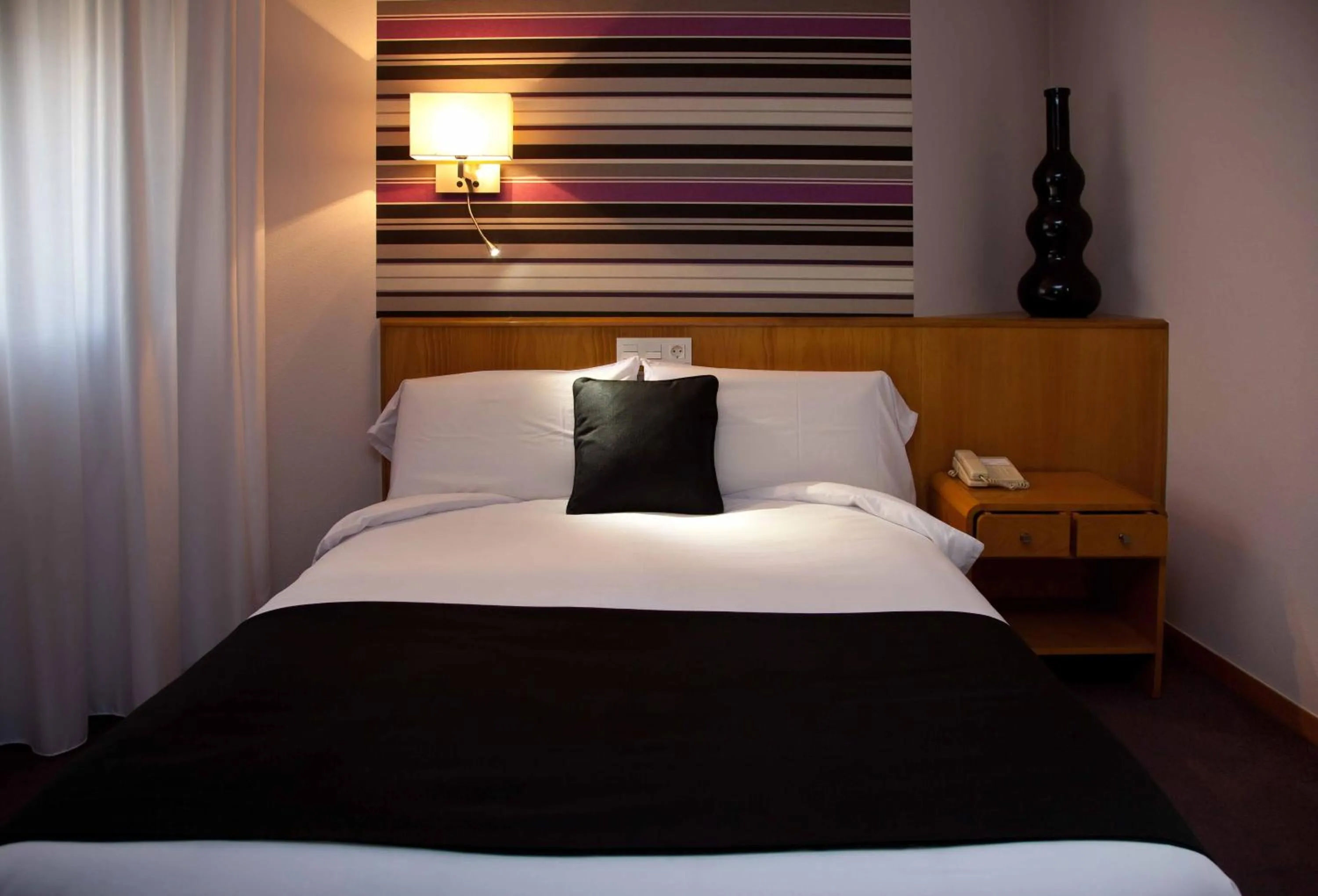 Bed in Hotel Palacio de Cristal