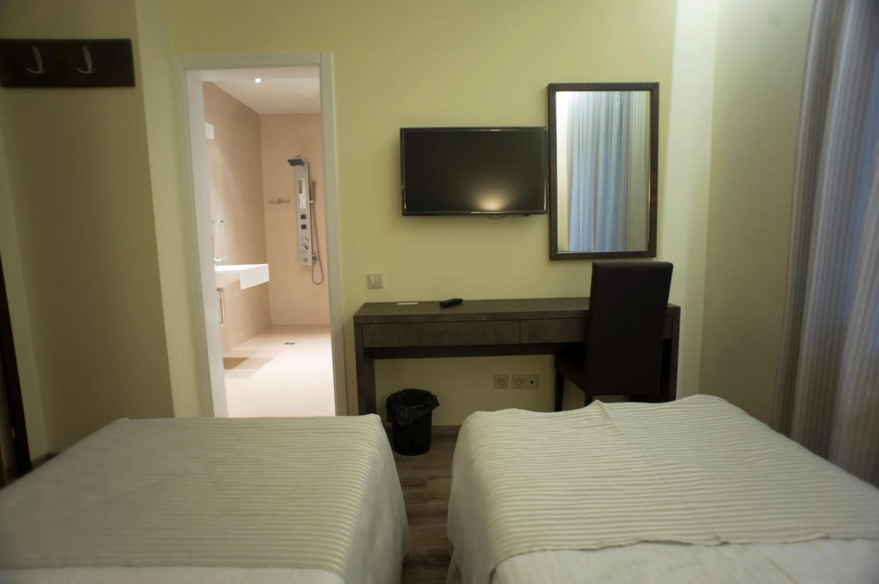 Bathroom, Bed in Aqua Varvara Hotel