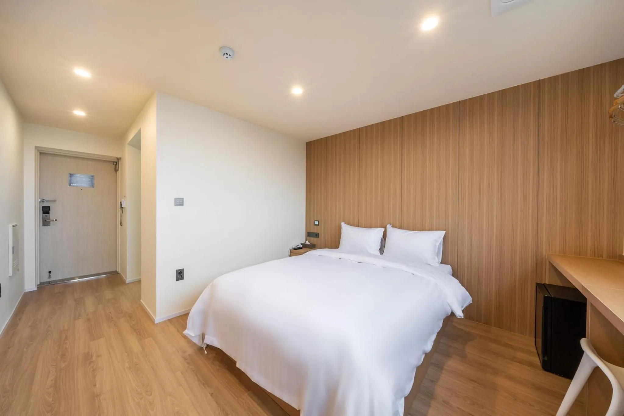 Bedroom in Aroomi Hotel