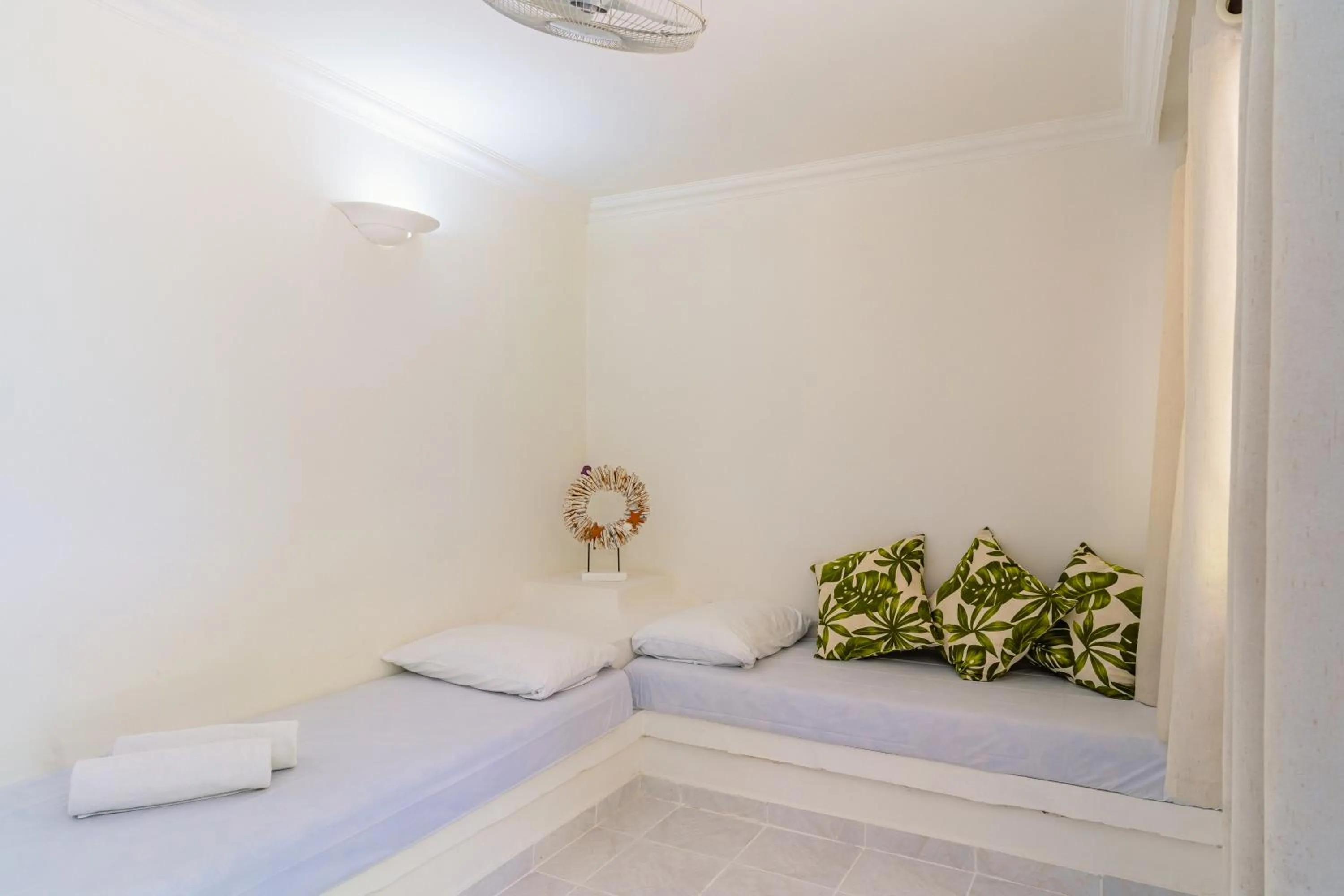 Bed in Hotel Cocoliso Island Resort