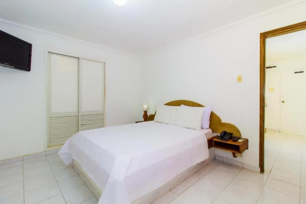 TV and multimedia, Bed in Hotel Cocoliso Island Resort