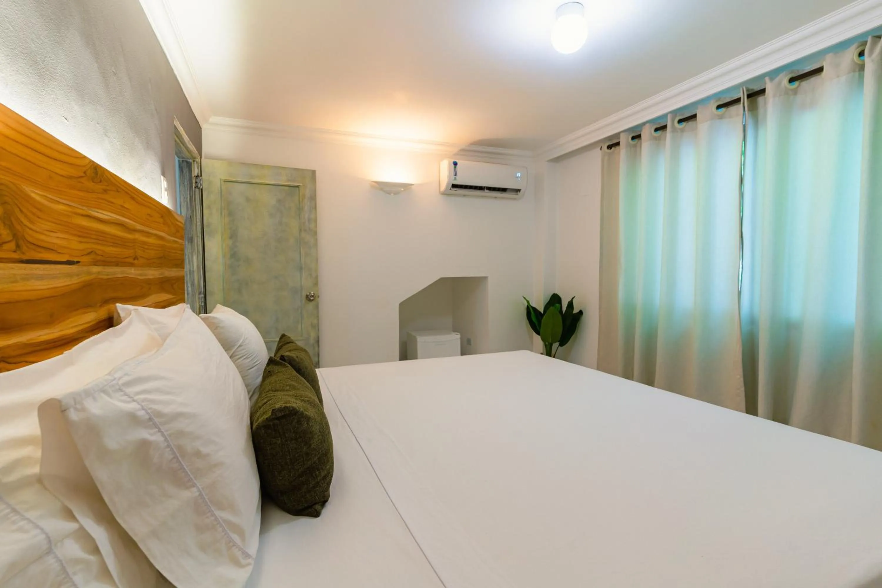 Bed in Hotel Cocoliso Island Resort