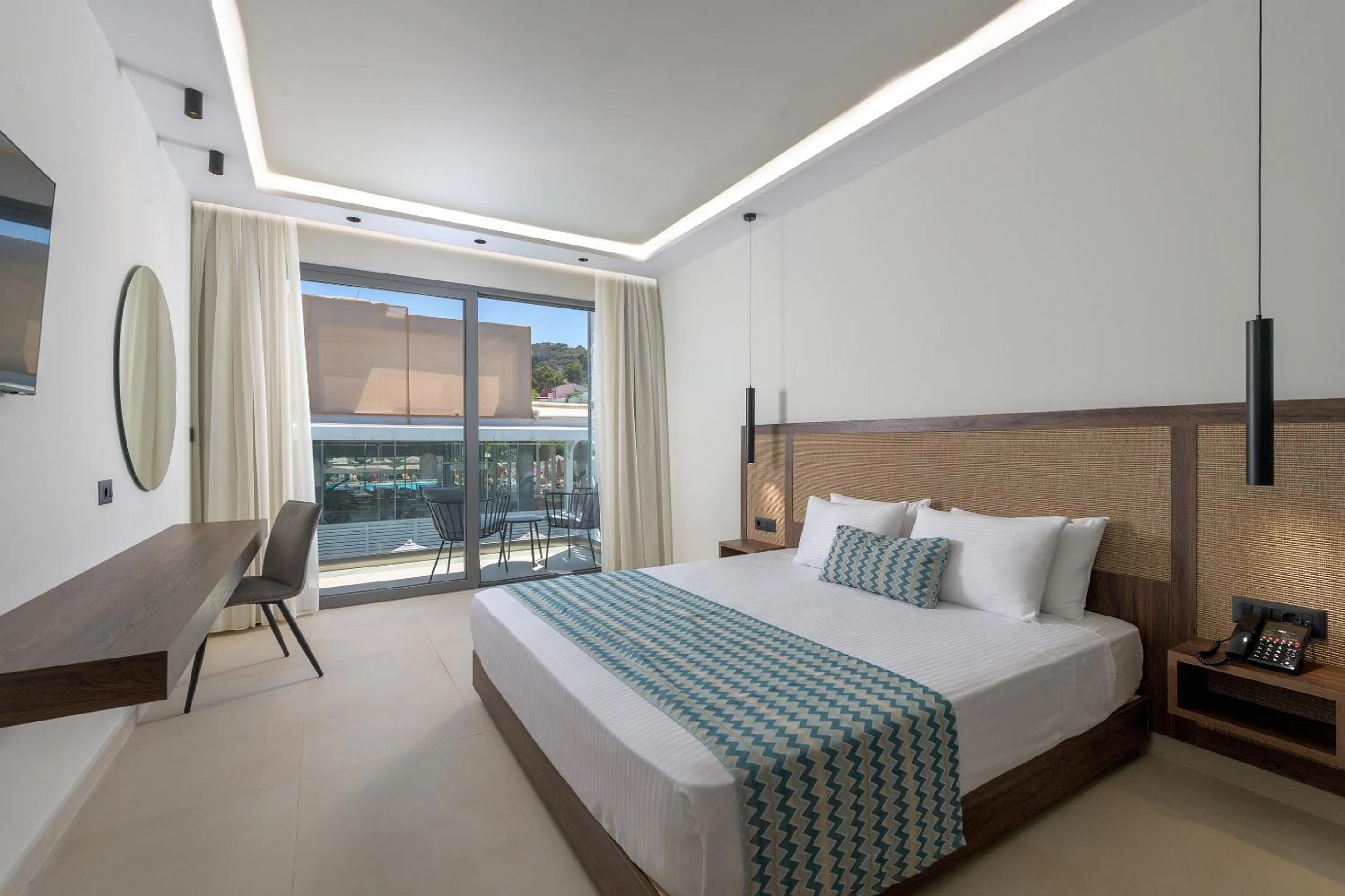 Bed in Oceanis Park Hotel