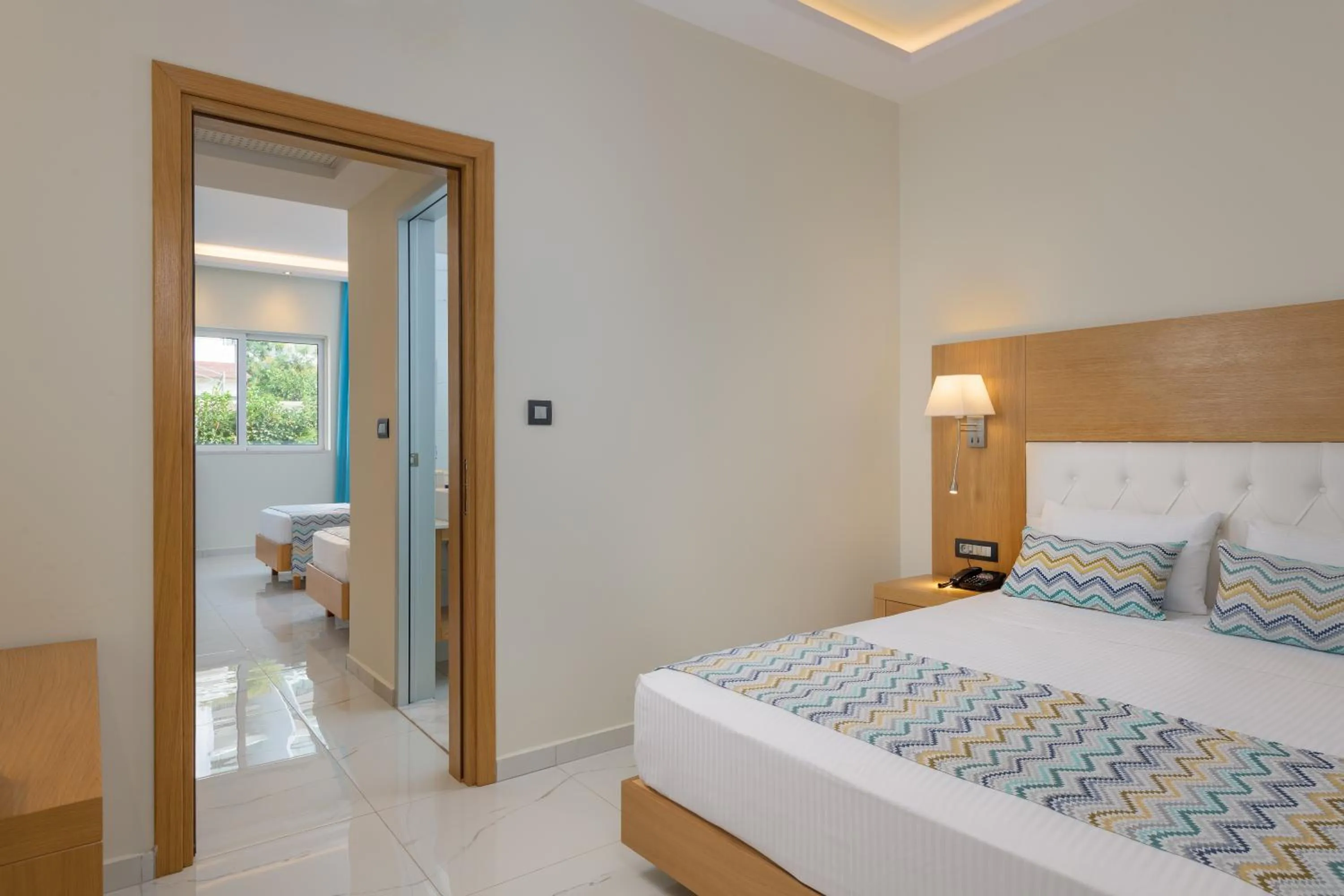 Bed in Oceanis Park Hotel