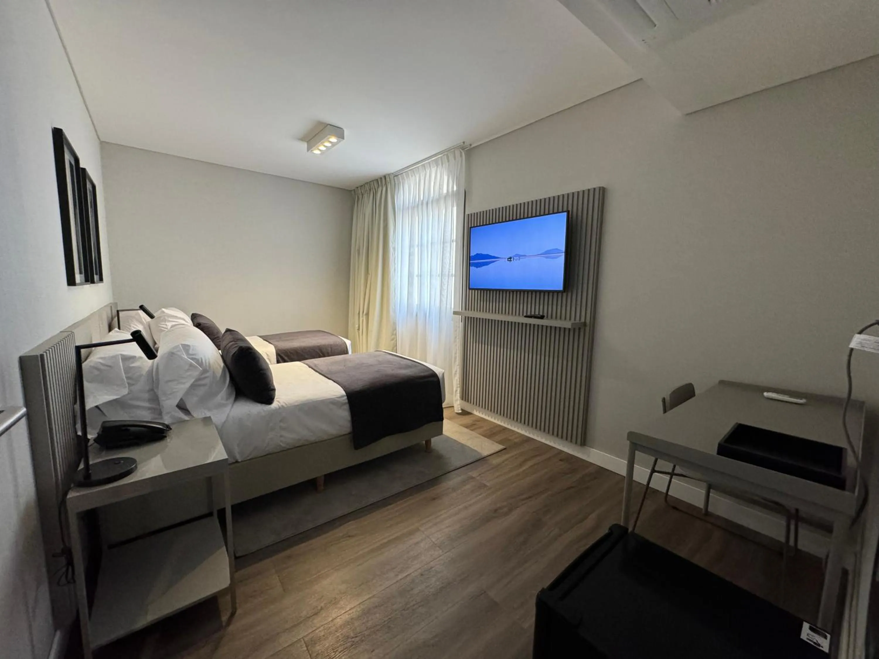 Bed in Guemes Hotel & Spa