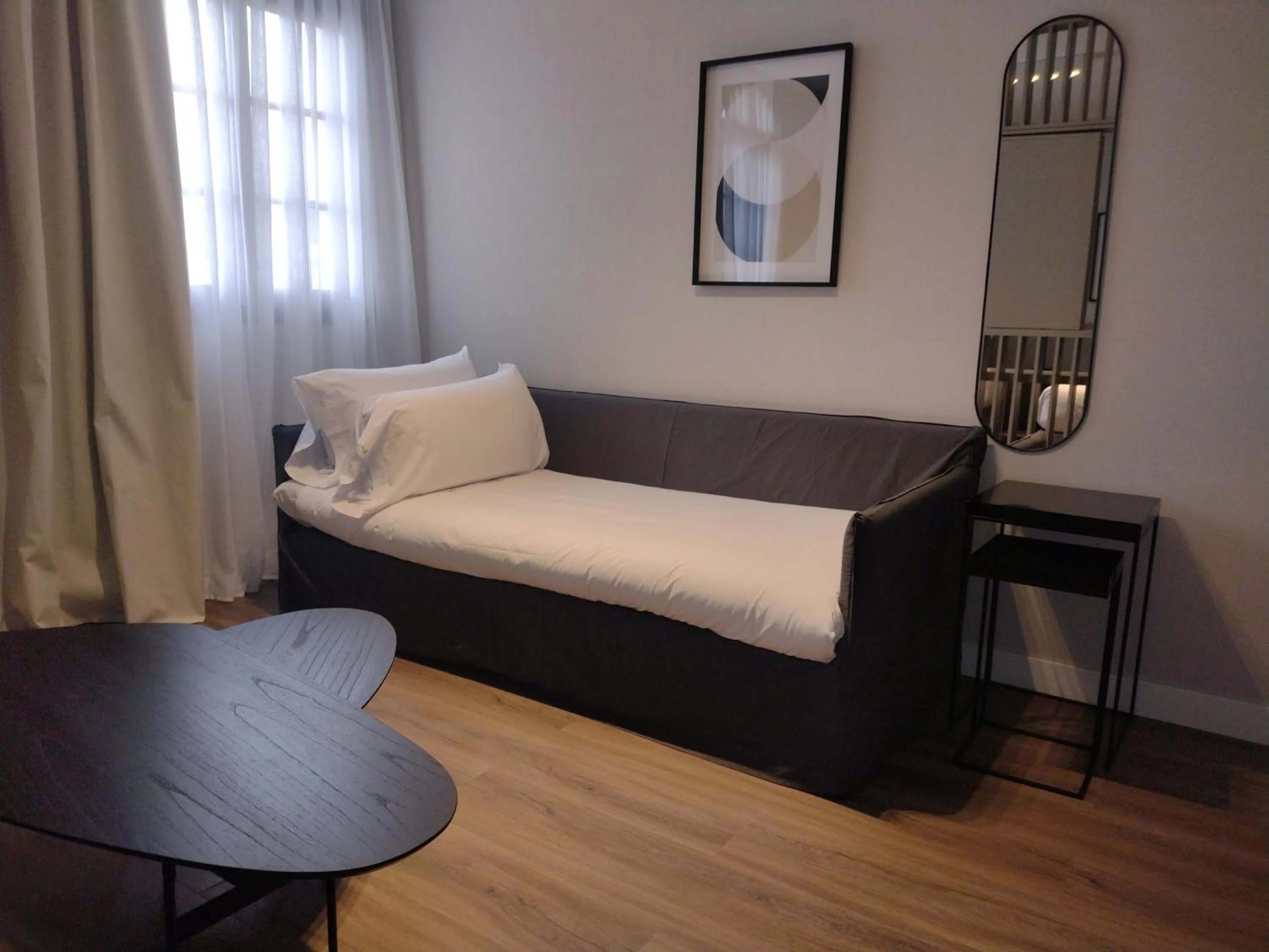 Bed in Guemes Hotel & Spa