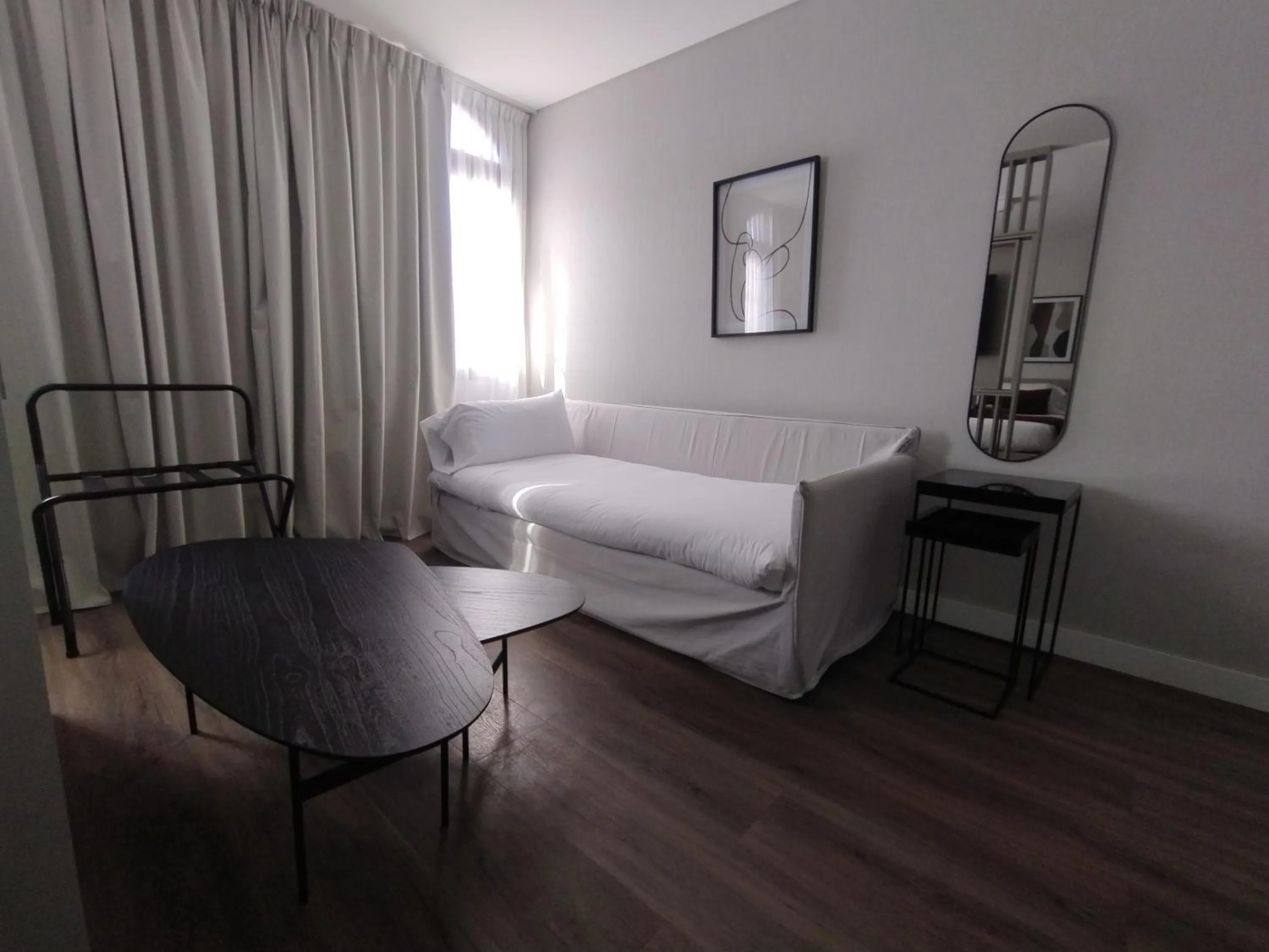 Living room, Bed in Guemes Hotel & Spa