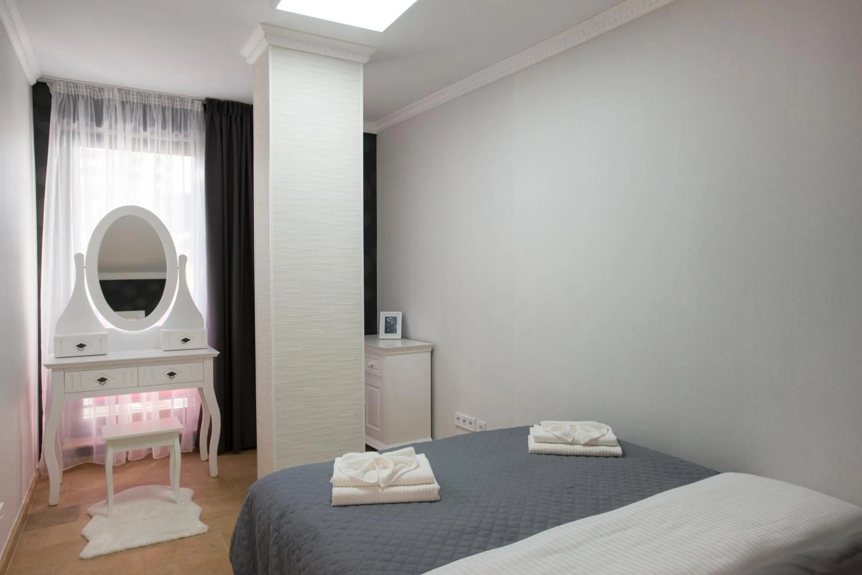 Bed in Lira Holiday Apartments