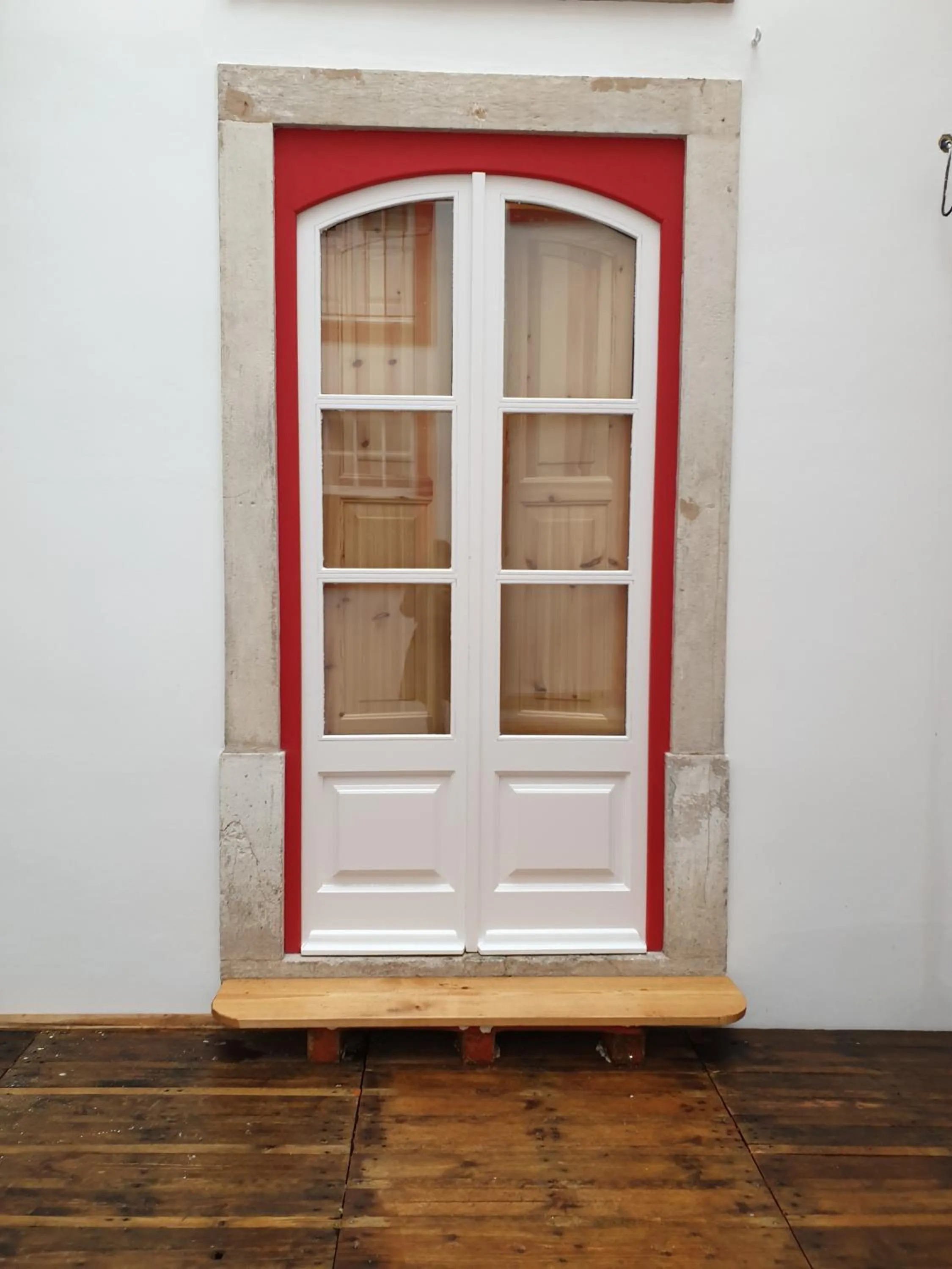 Facade/entrance in Casa da Baixa by PURUS