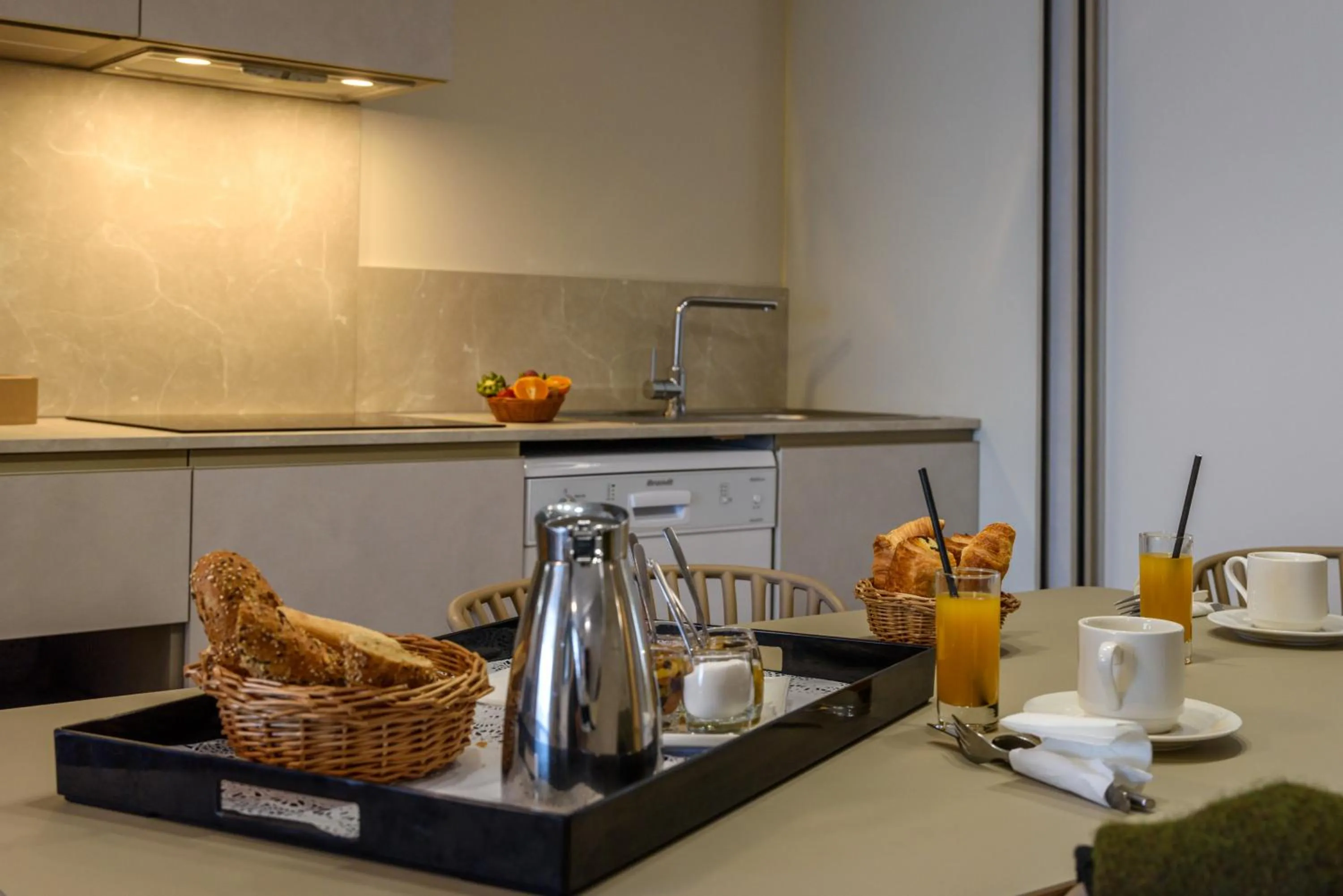 Kitchen or kitchenette in Residence de Tourisme Ajaccio Amirauté