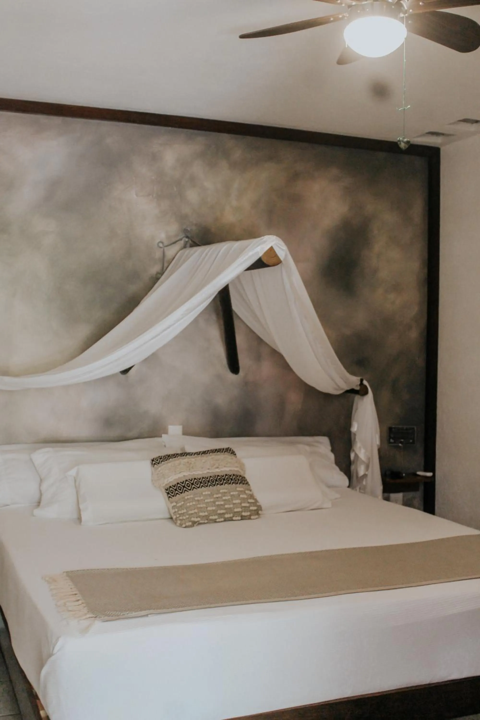 Bed in Casa de Olas Boutique Hotel