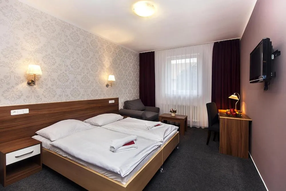 Bed in Hotel Arkáda