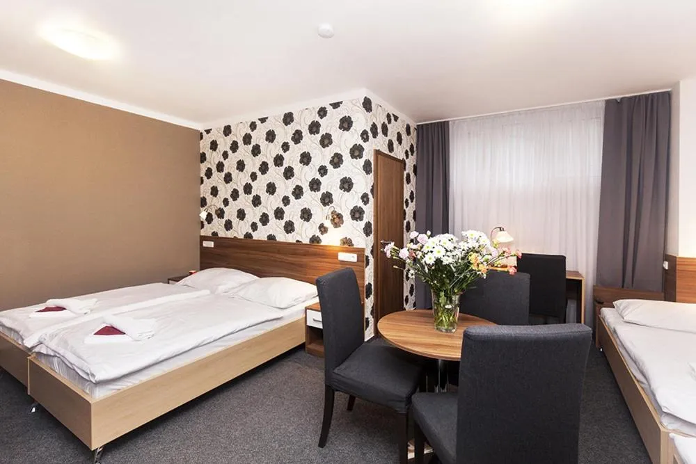 Bed in Hotel Arkáda