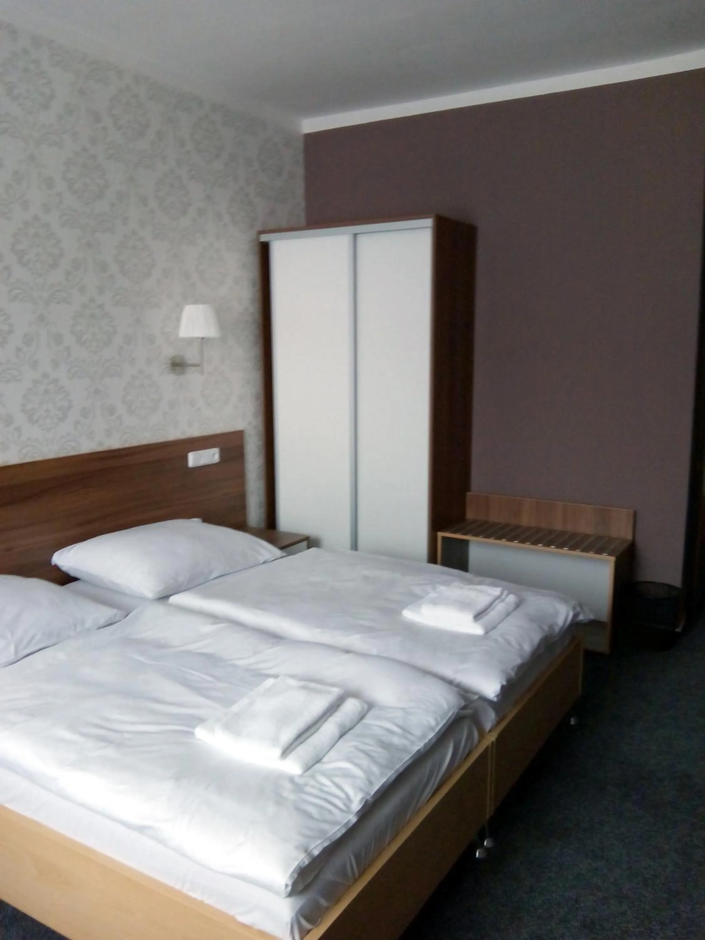 Bed in Hotel Arkáda